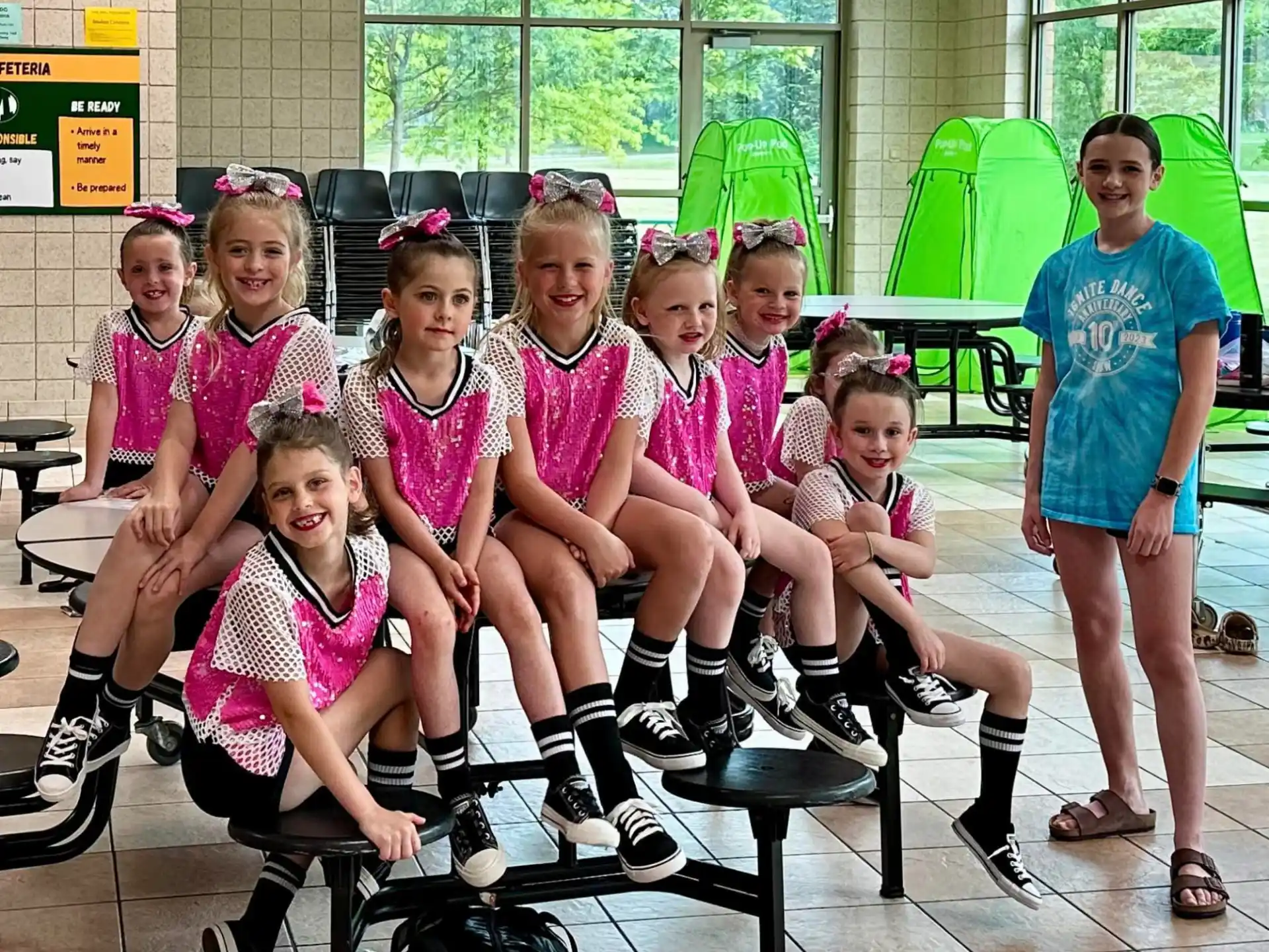 a group of children posing for a photo