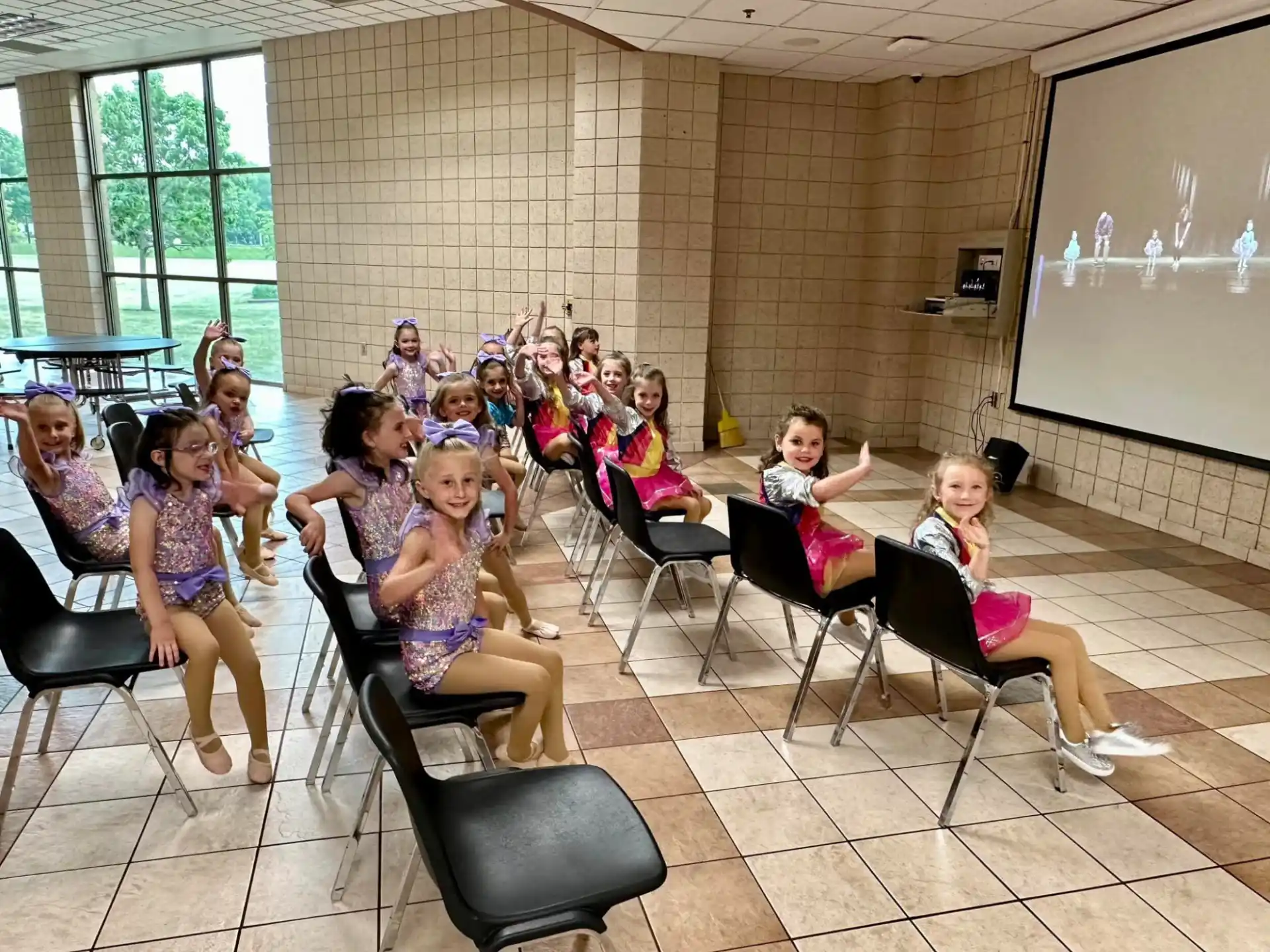 a group of people sitting in chairs