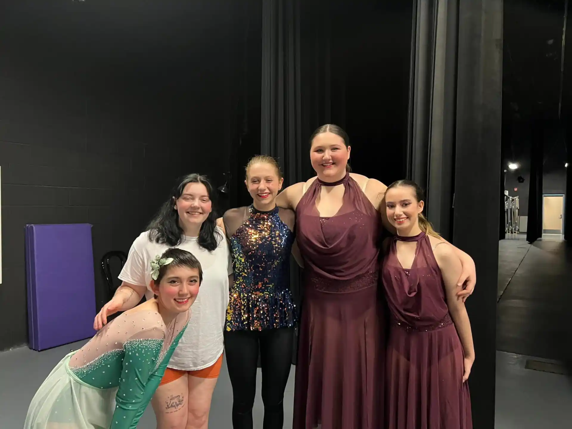 a group of women posing for a photo