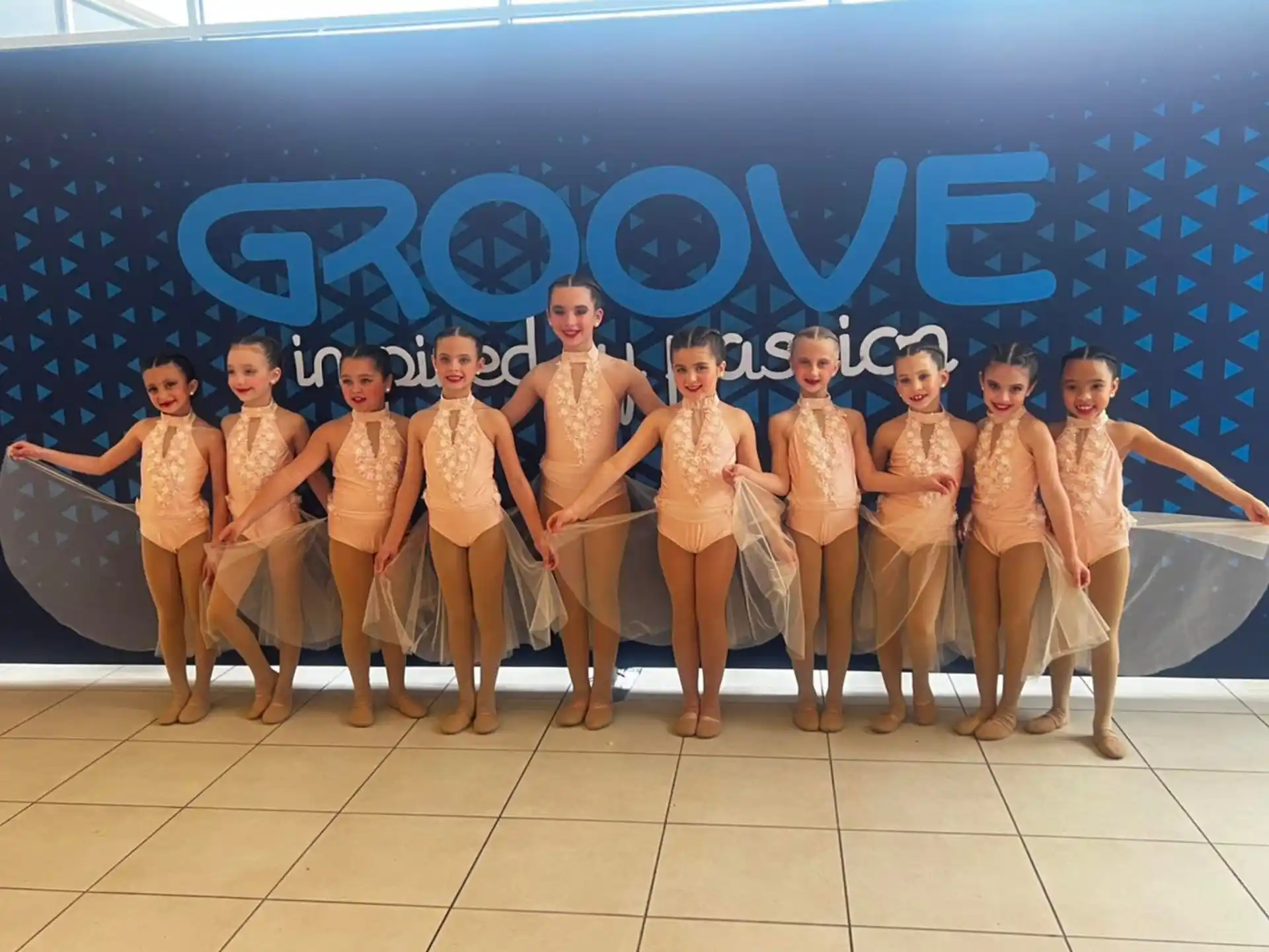 a group of children posing for a photo