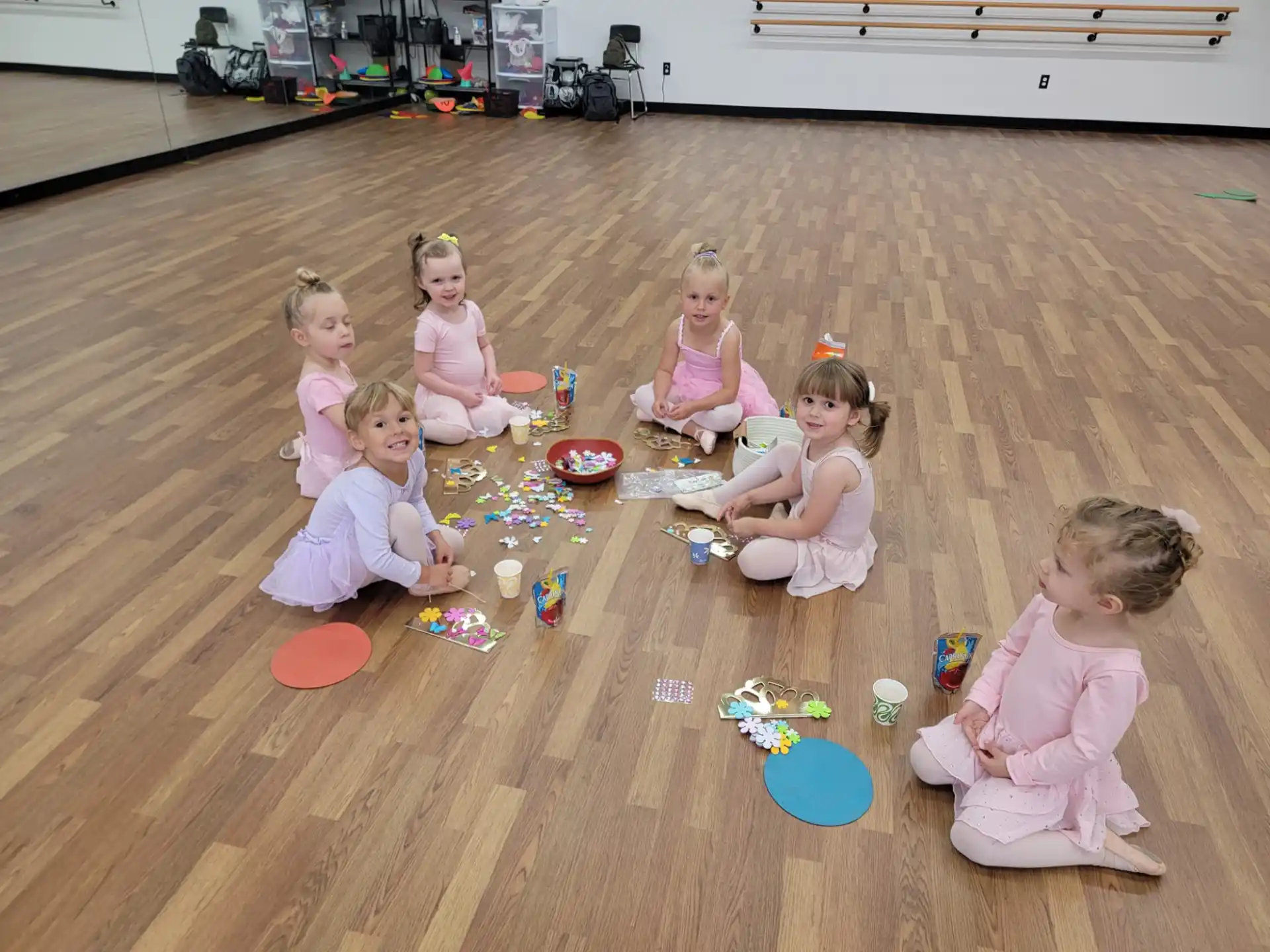 a group of children playing with toys