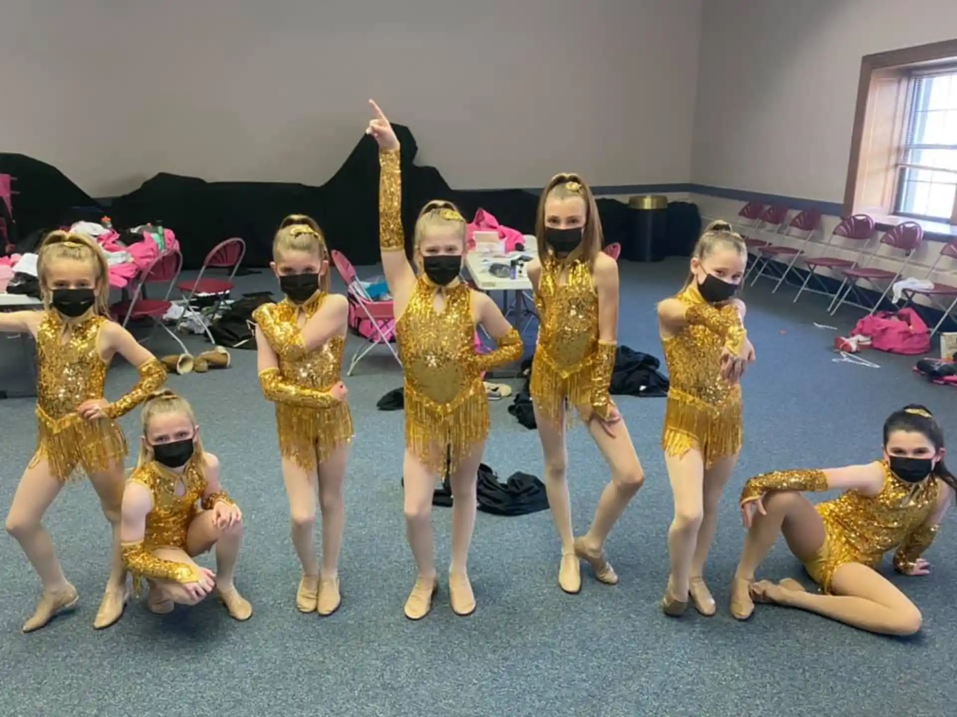 a group of girls wearing clothing