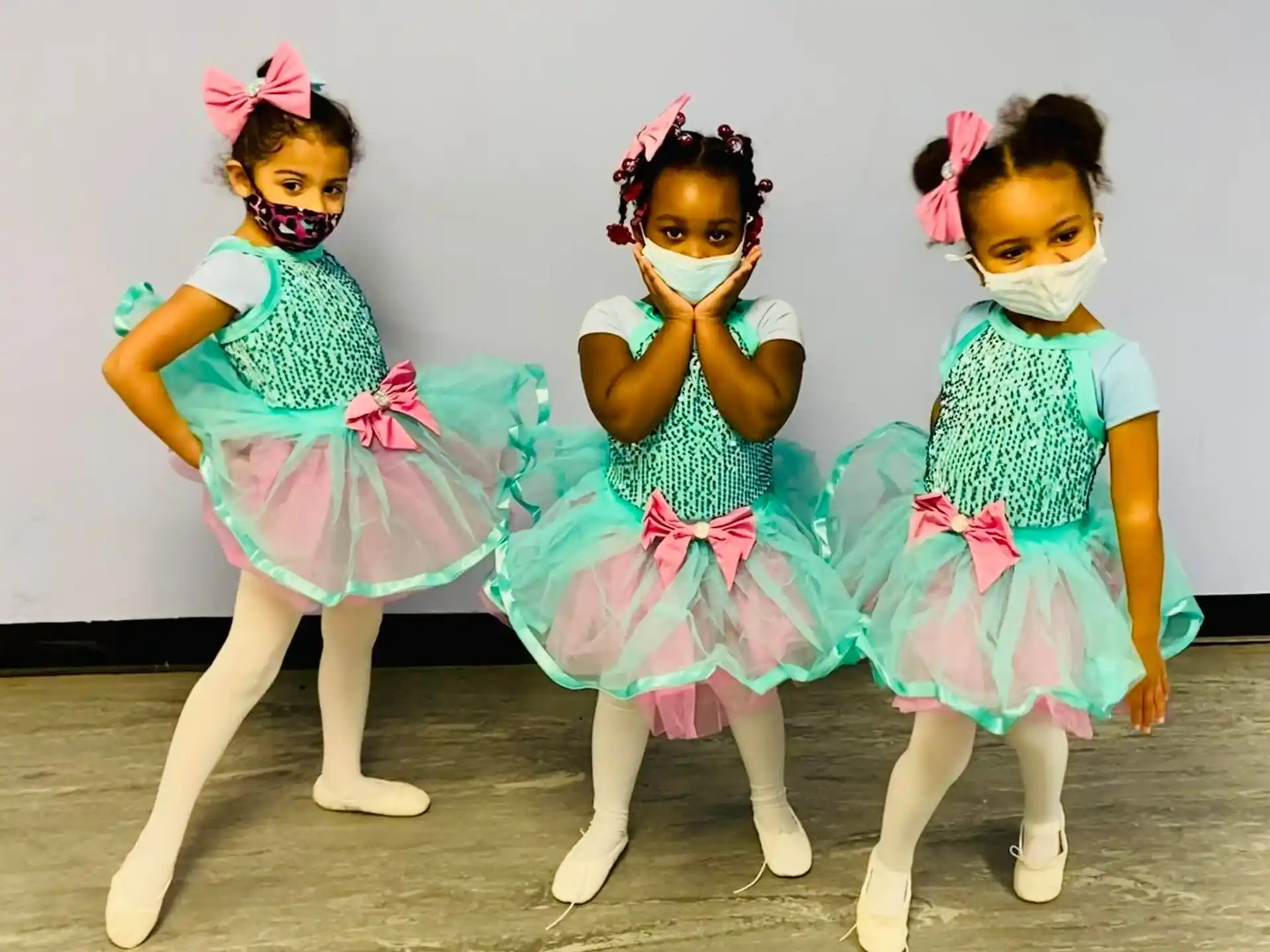 a group of girls wearing clothing