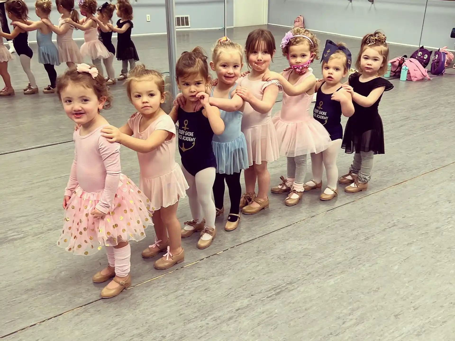 a group of children posing for a photo