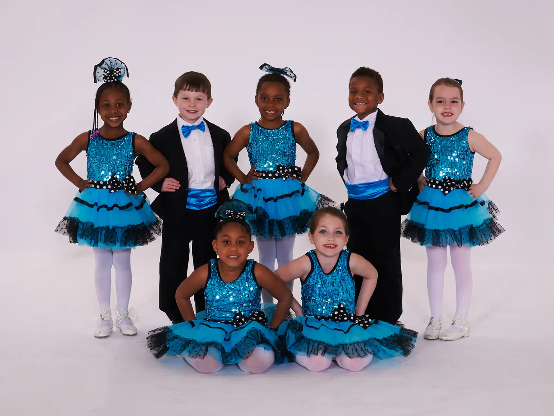 a group of children in clothing