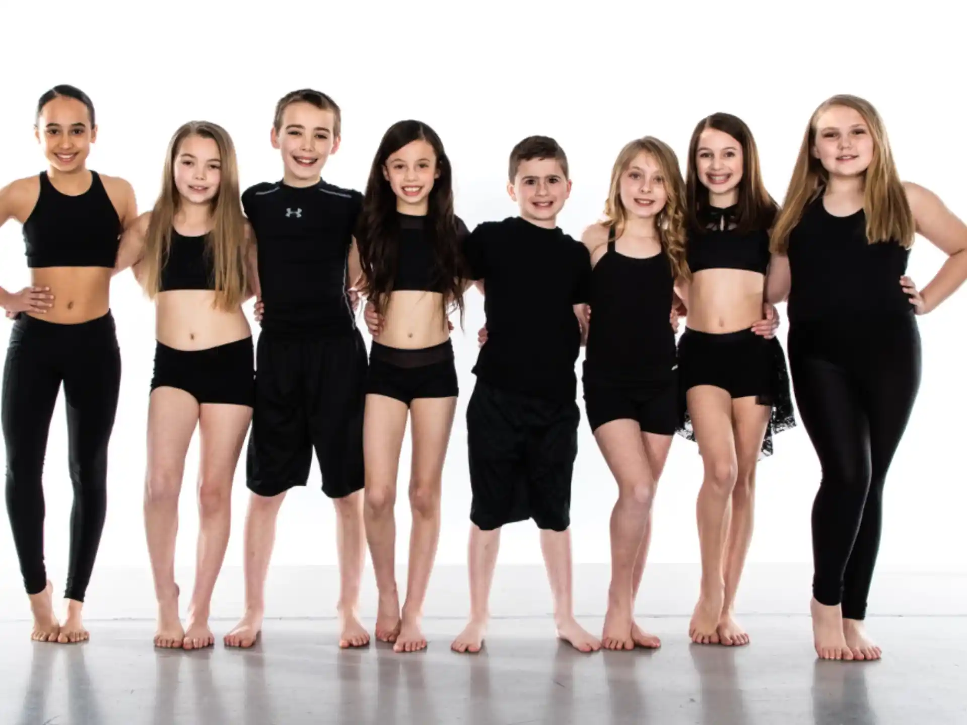 a group of people posing for the camera