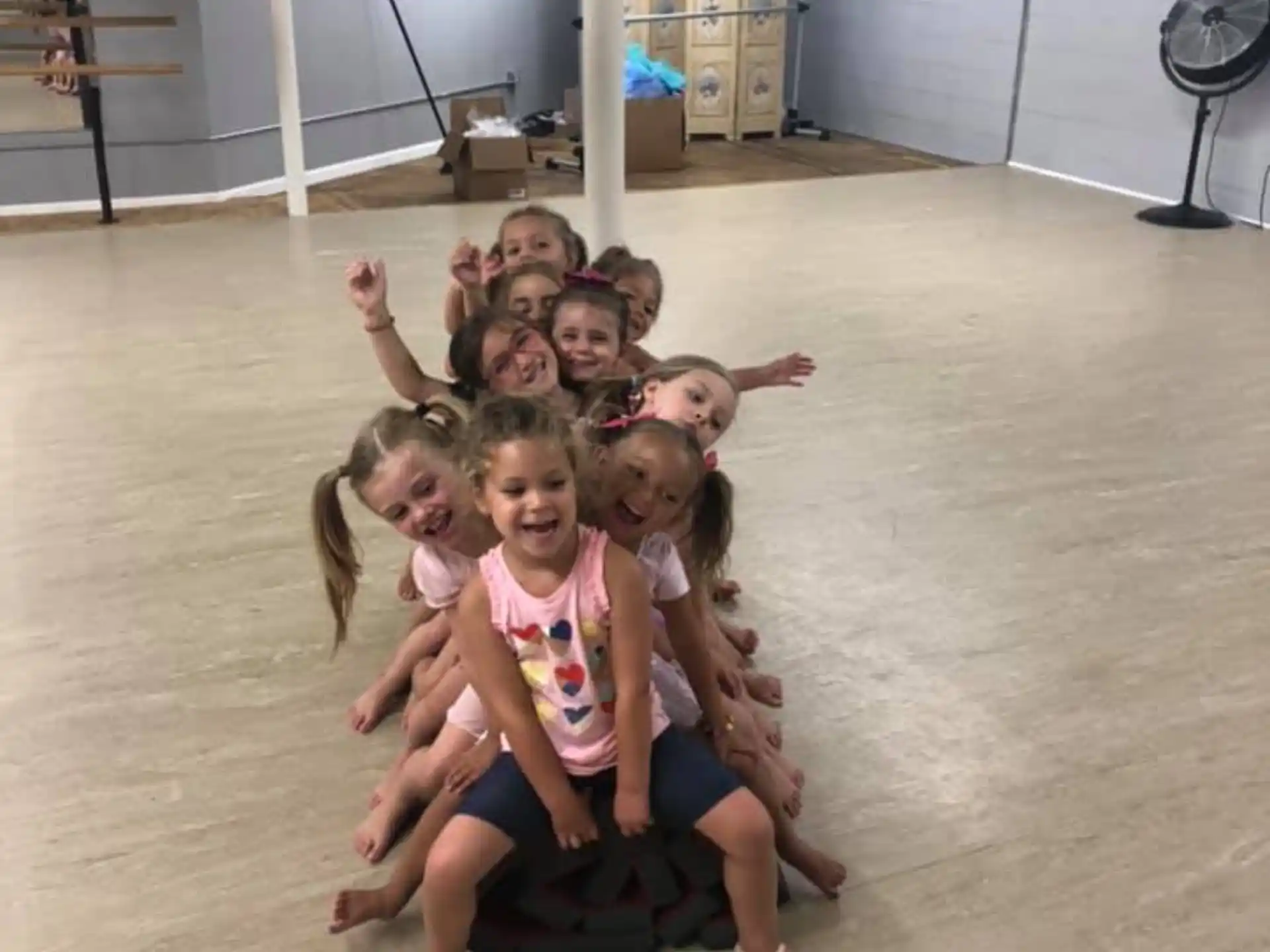 a group of children posing for a photo