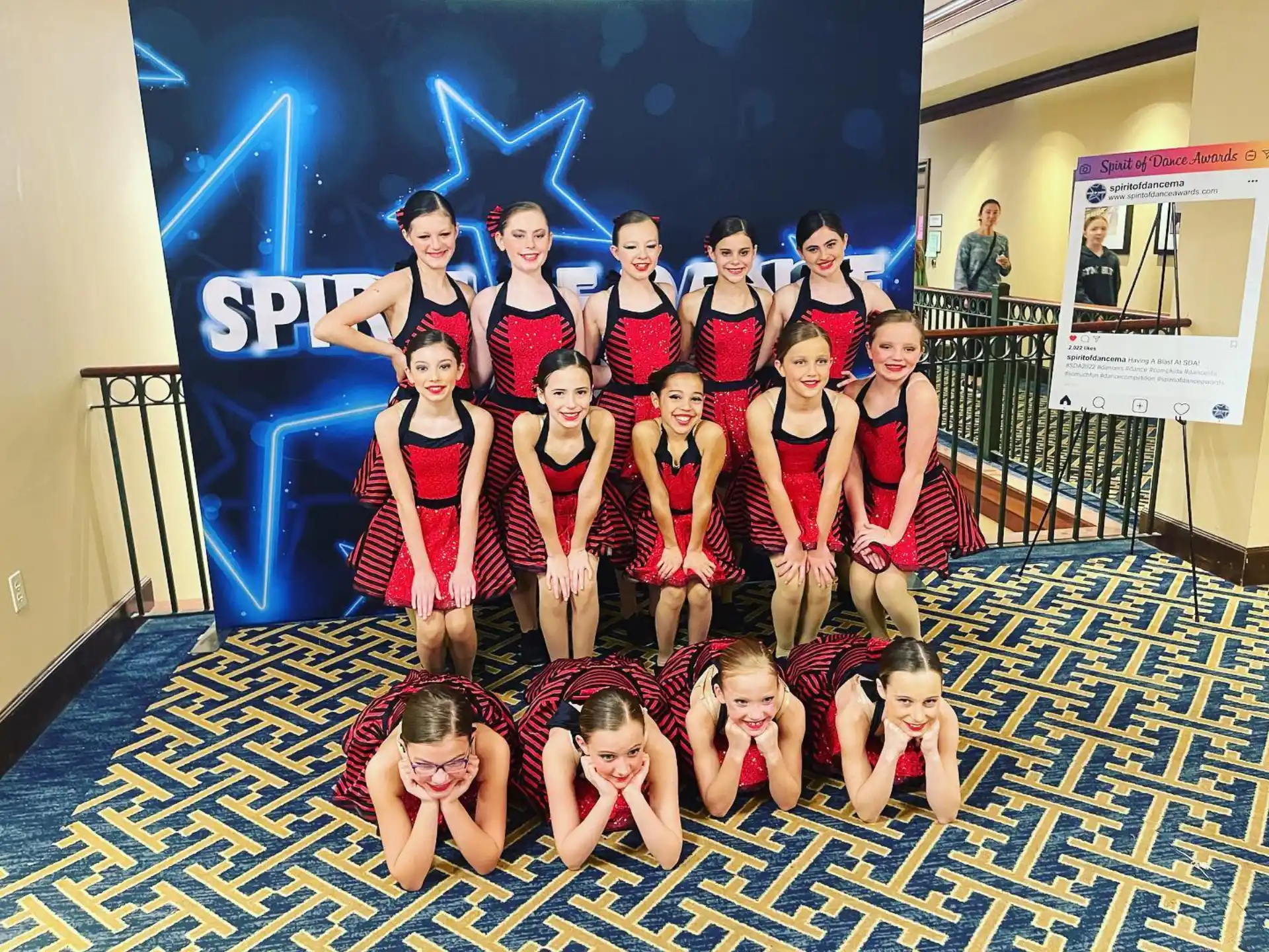 a group of girls posing for a photo