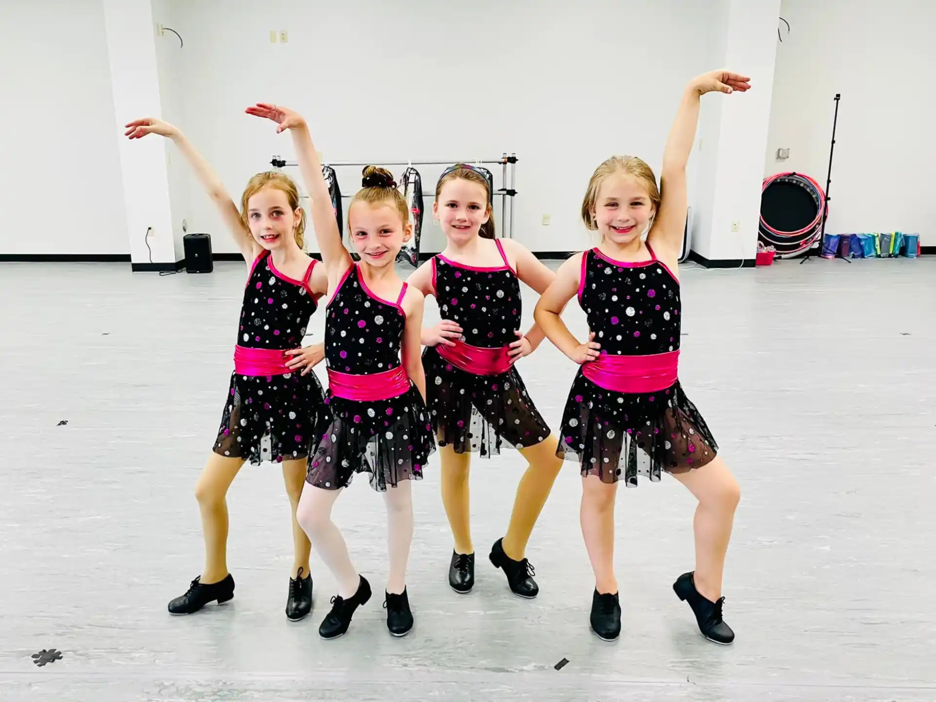 a group of girls posing for a picture