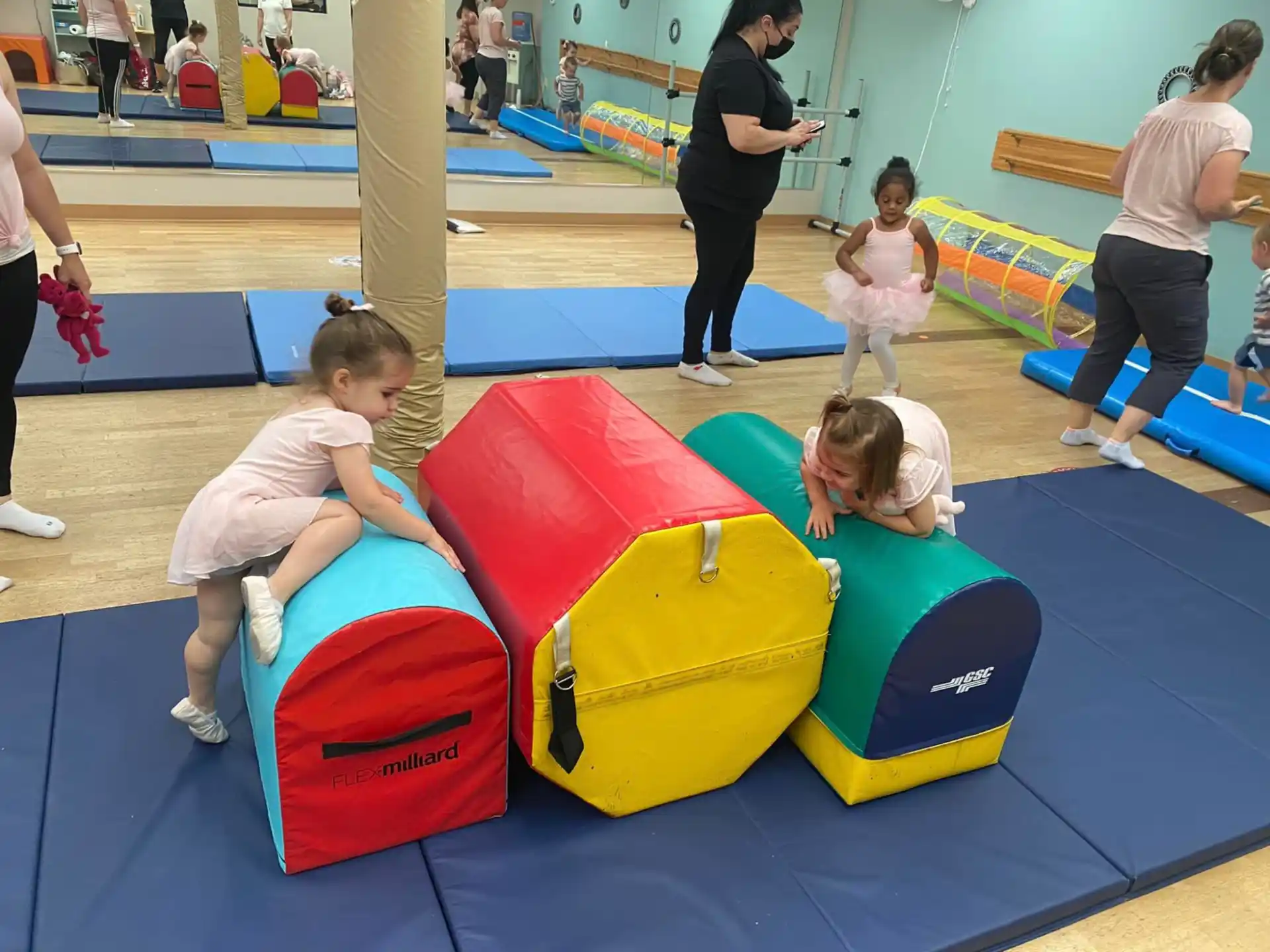 a group of children playing on a playground