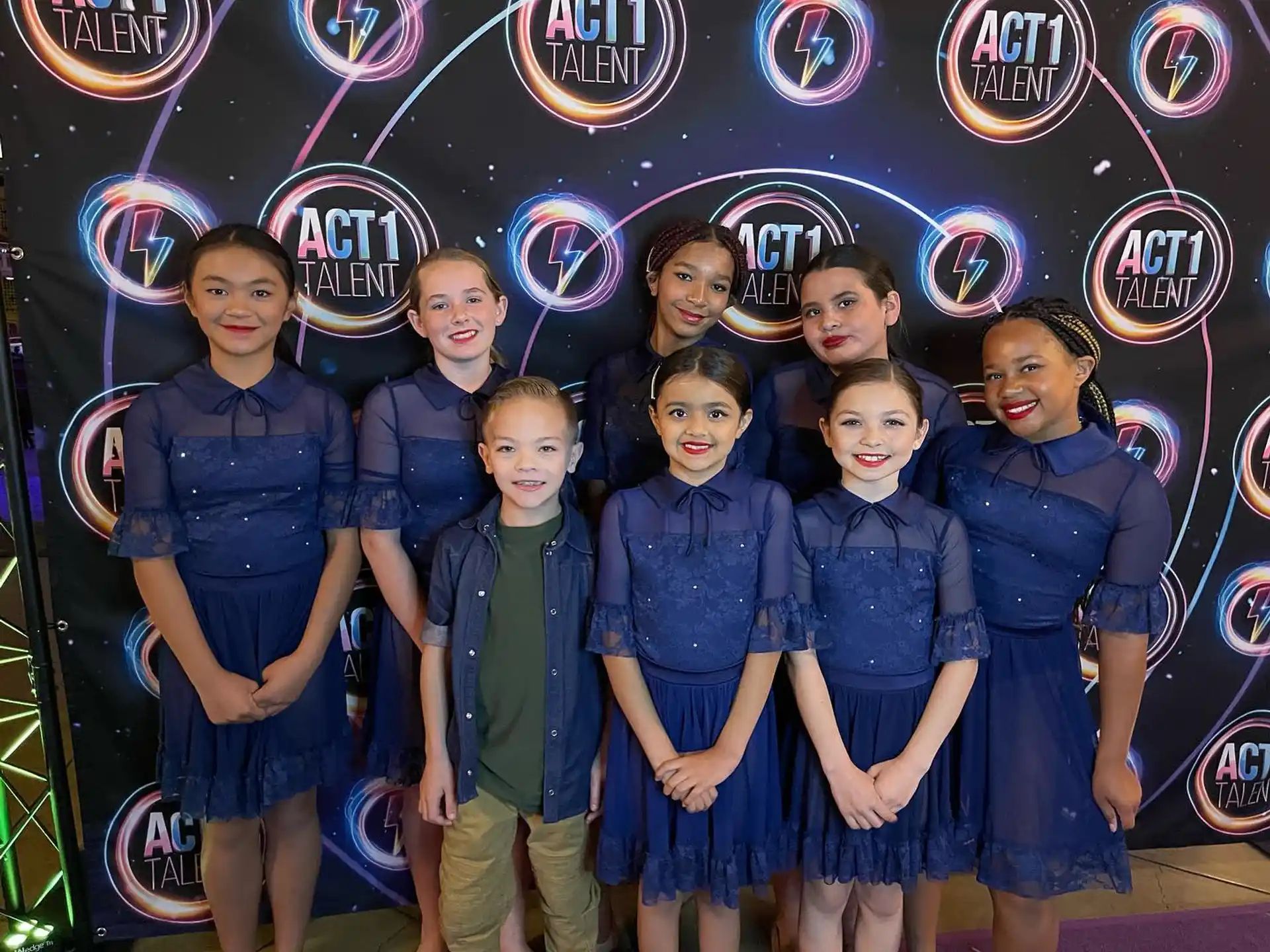 a group of children posing for a photo
