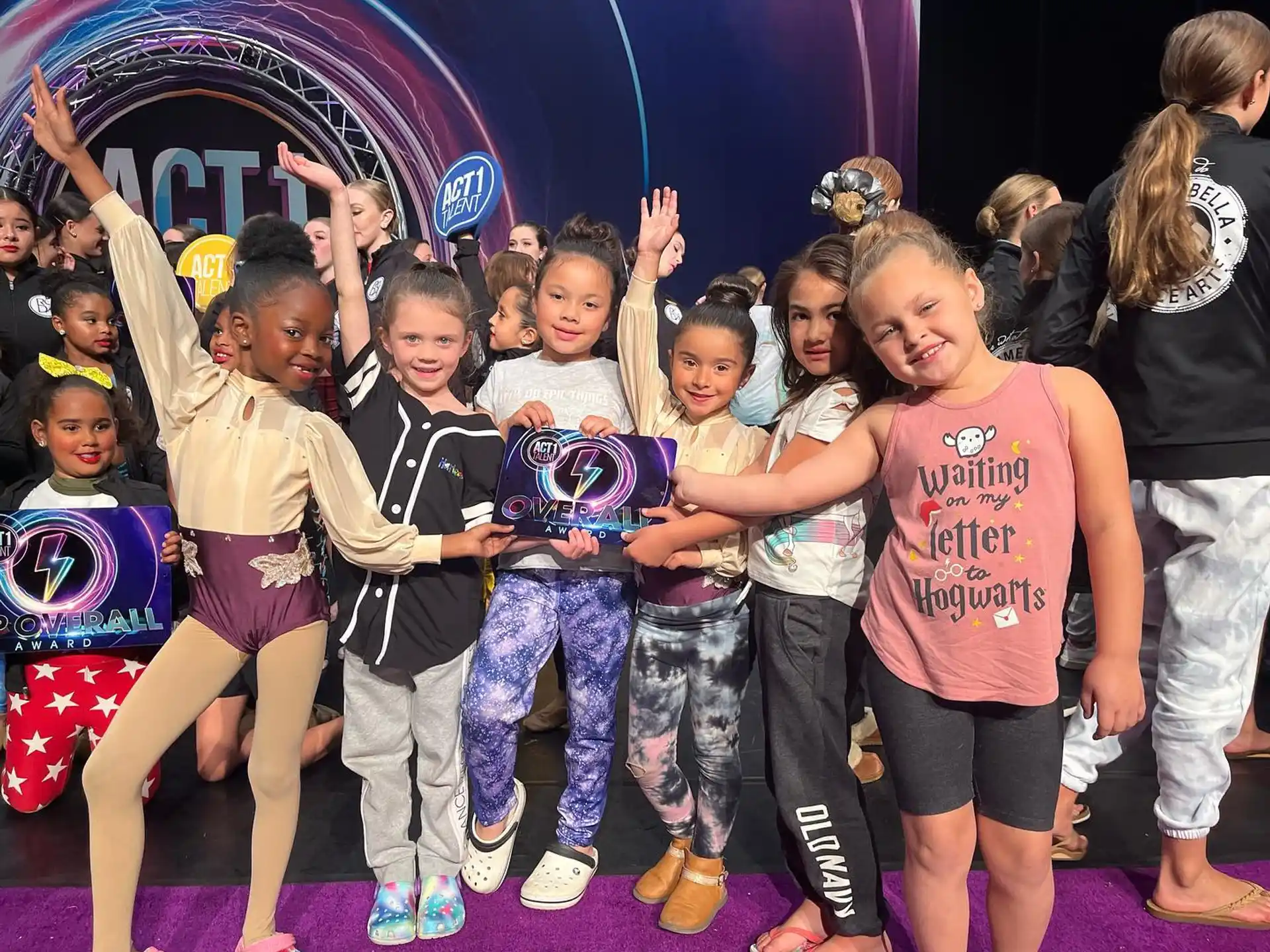 a group of girls posing for a photo