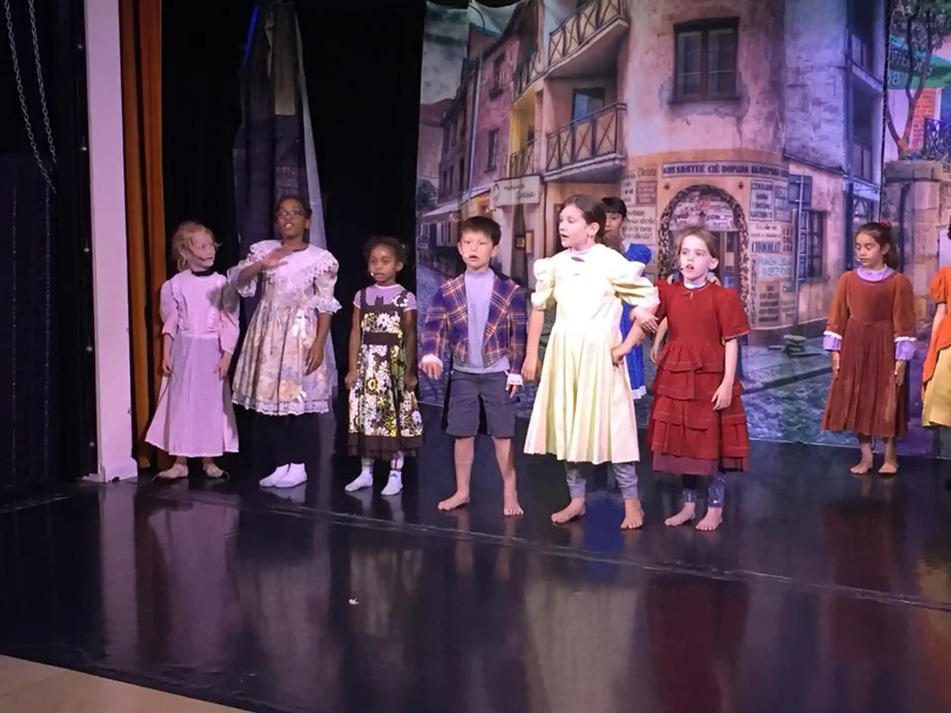 a group of children on a stage