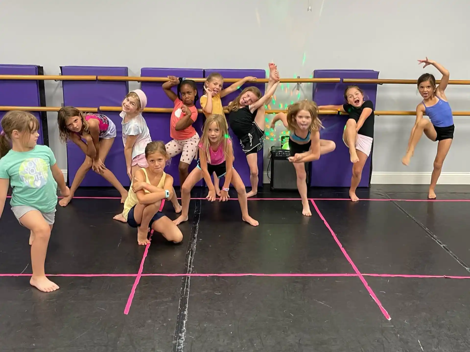 a group of girls posing for a photo