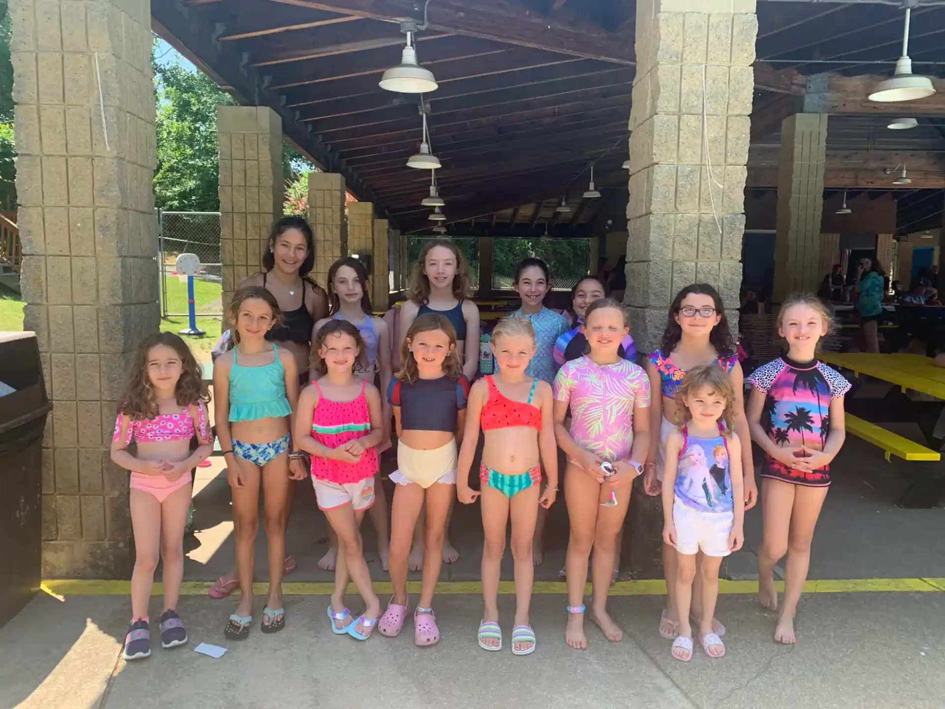 a group of girls posing for a photo