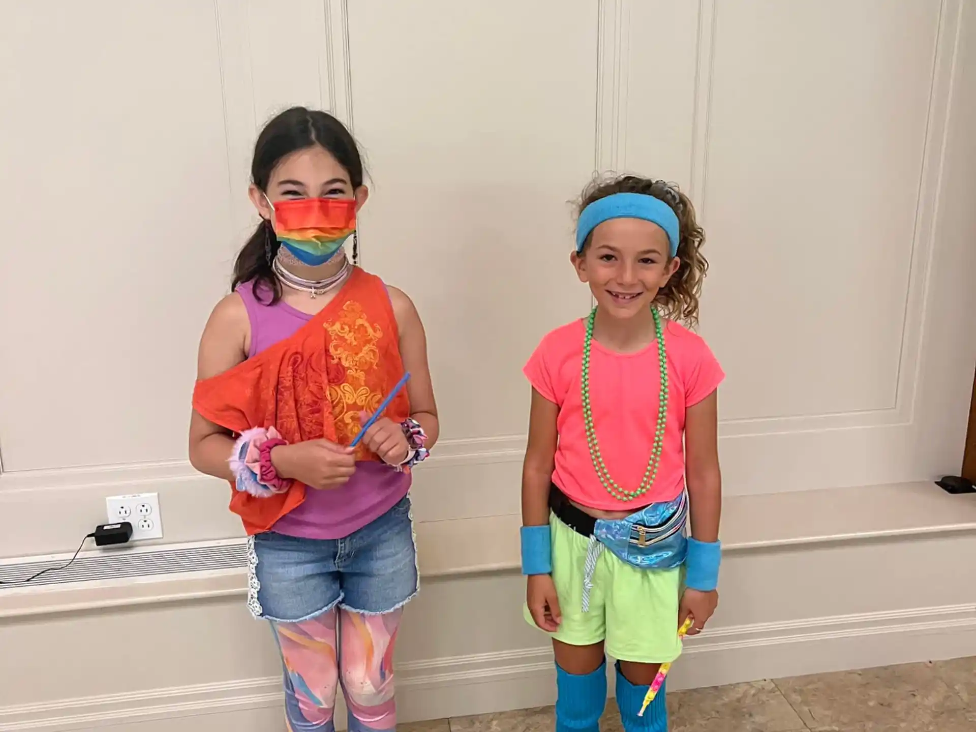 a group of girls wearing clothing