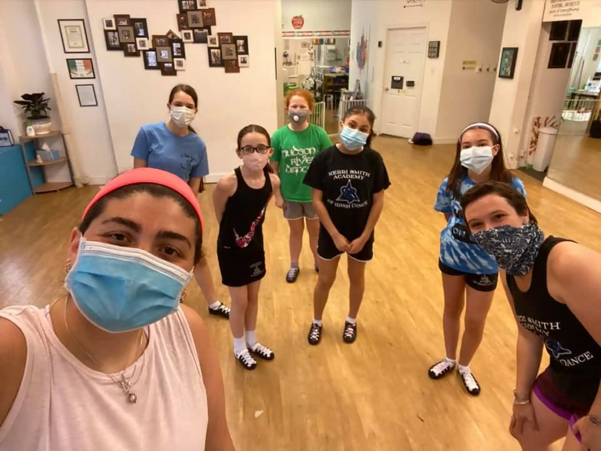 a group of people wearing masks