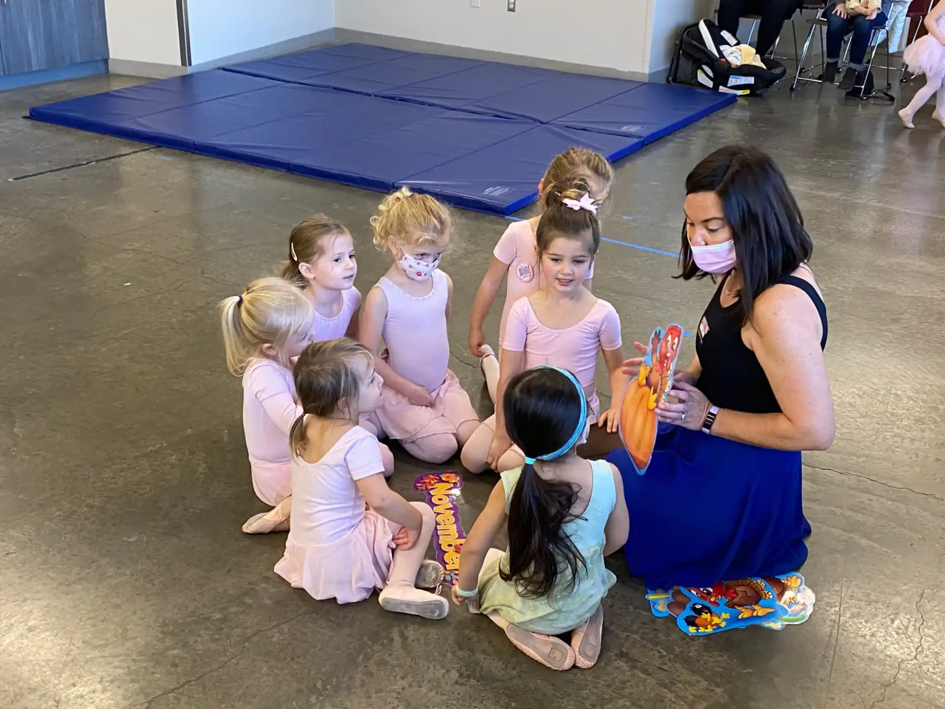 a group of children wearing masks