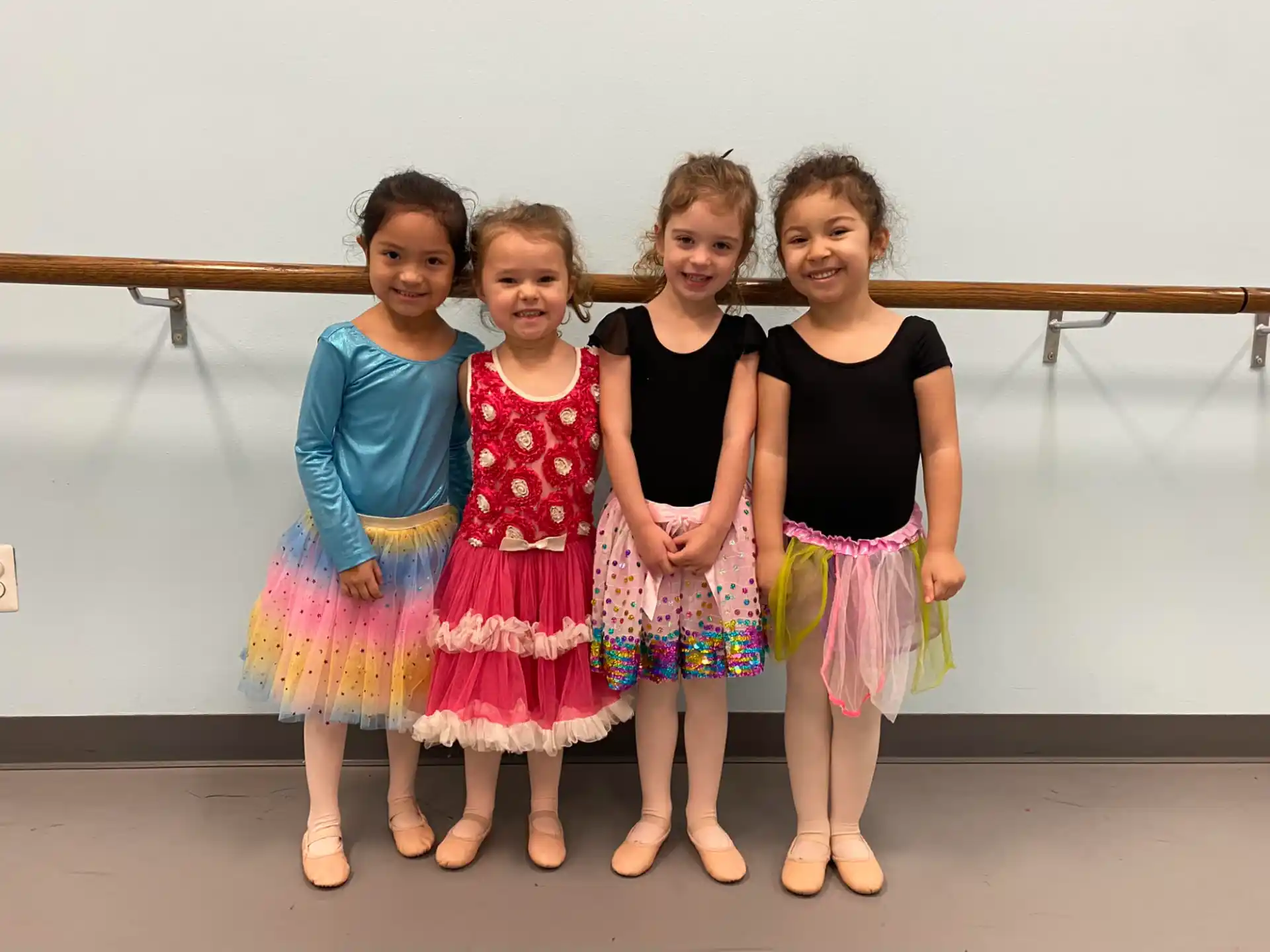 a group of girls posing for a photo