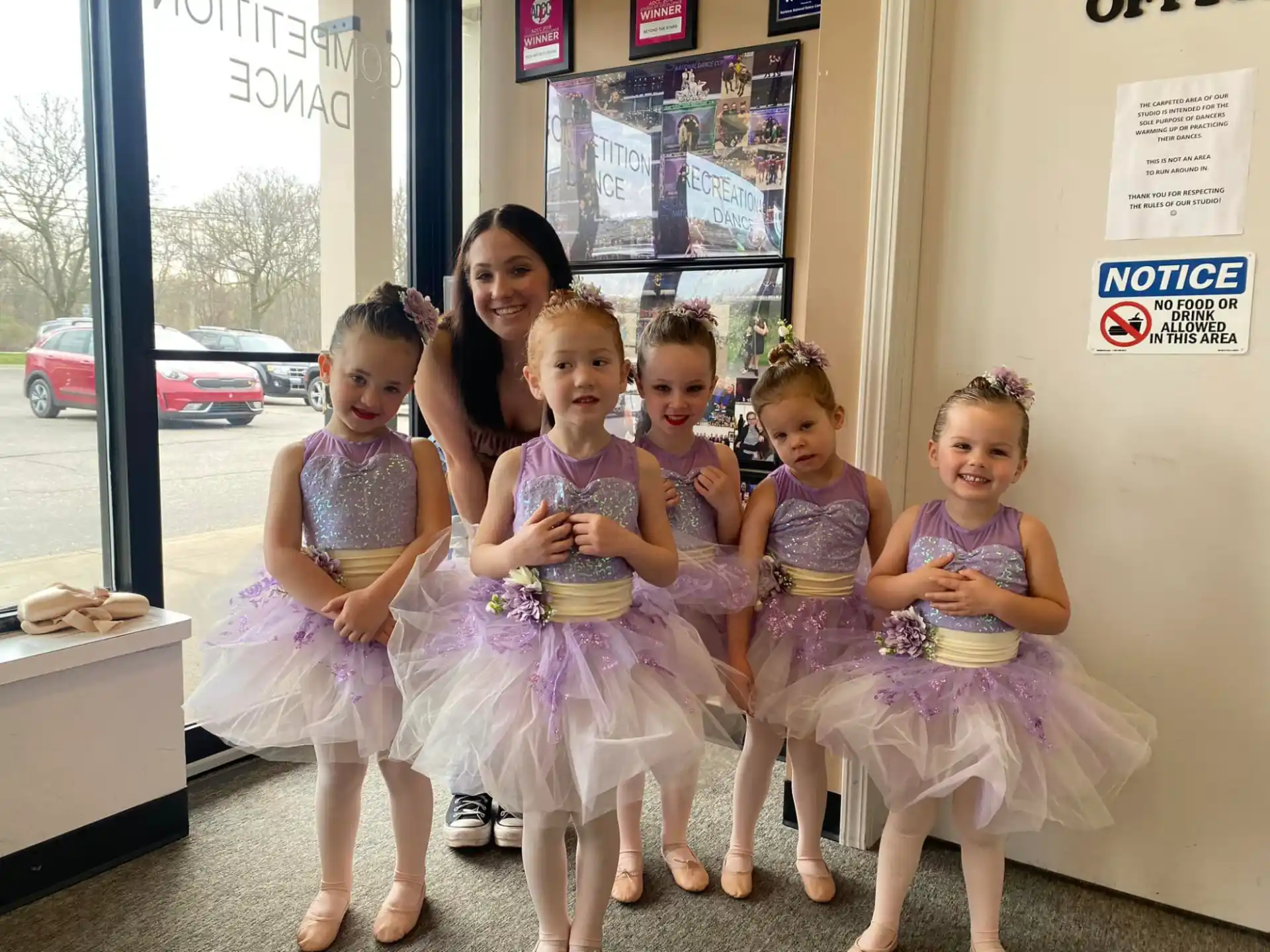 a group of girls posing for a photo