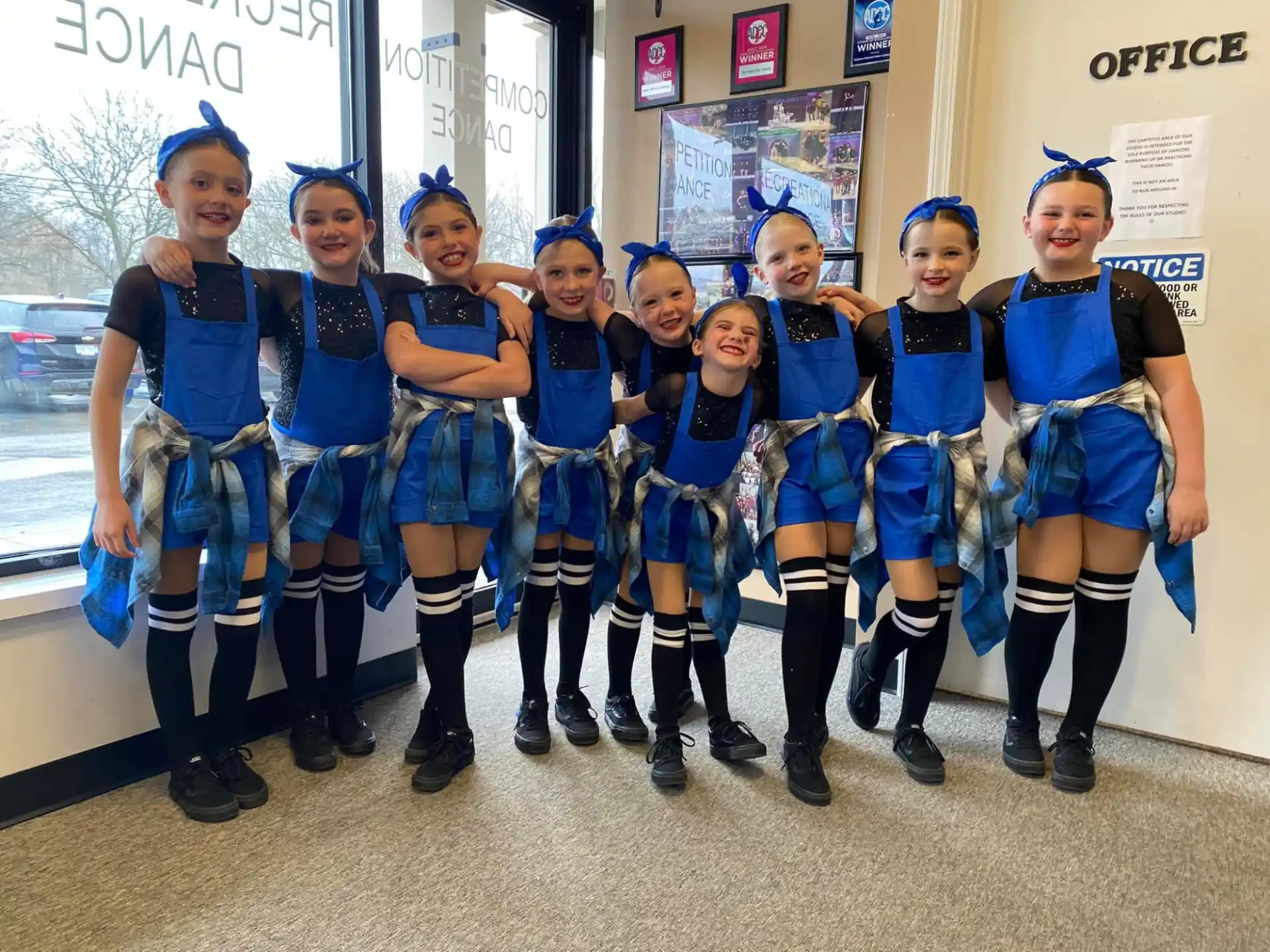 a group of women in blue and white uniforms