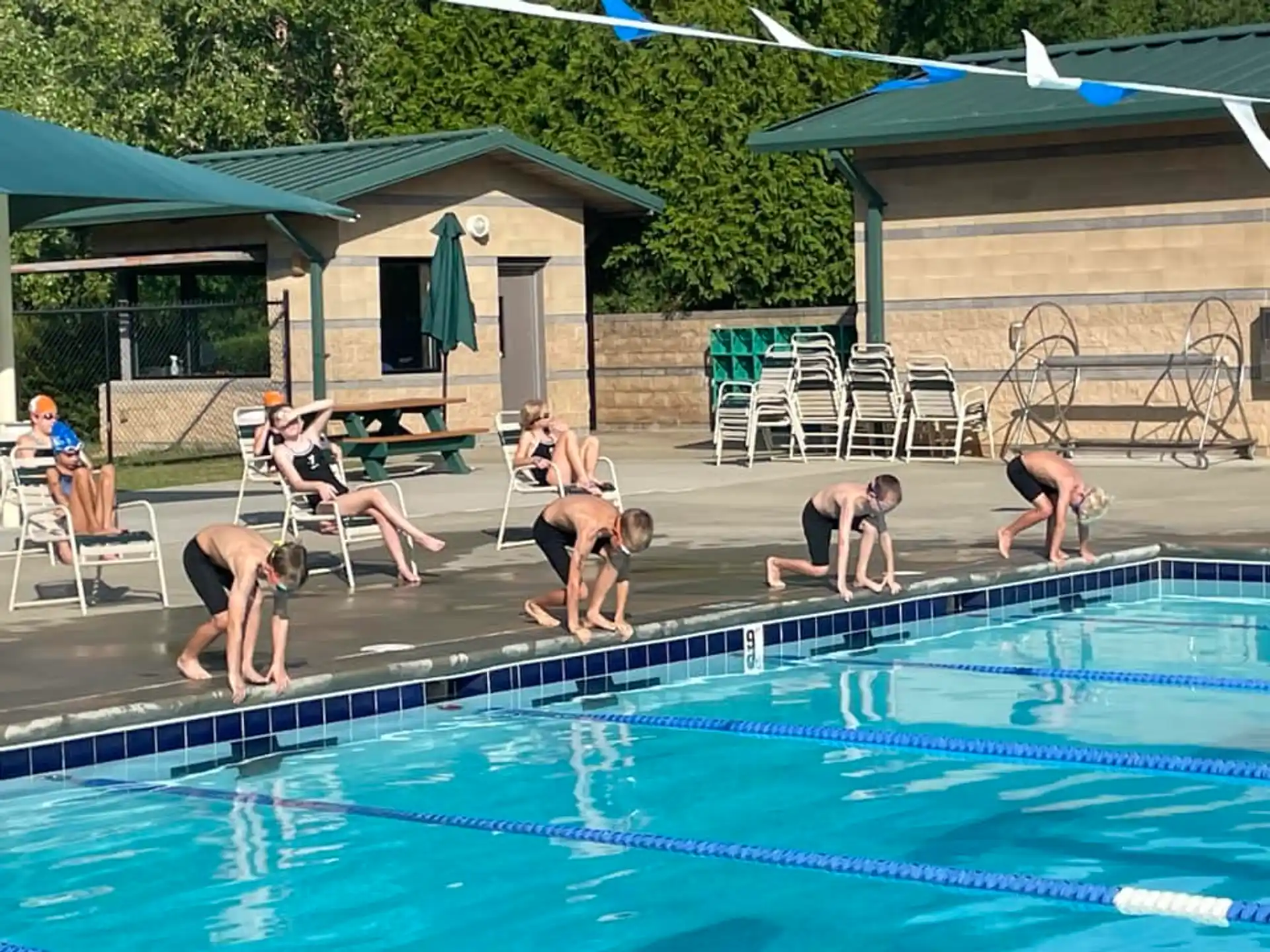 a group of people in a swimming pool