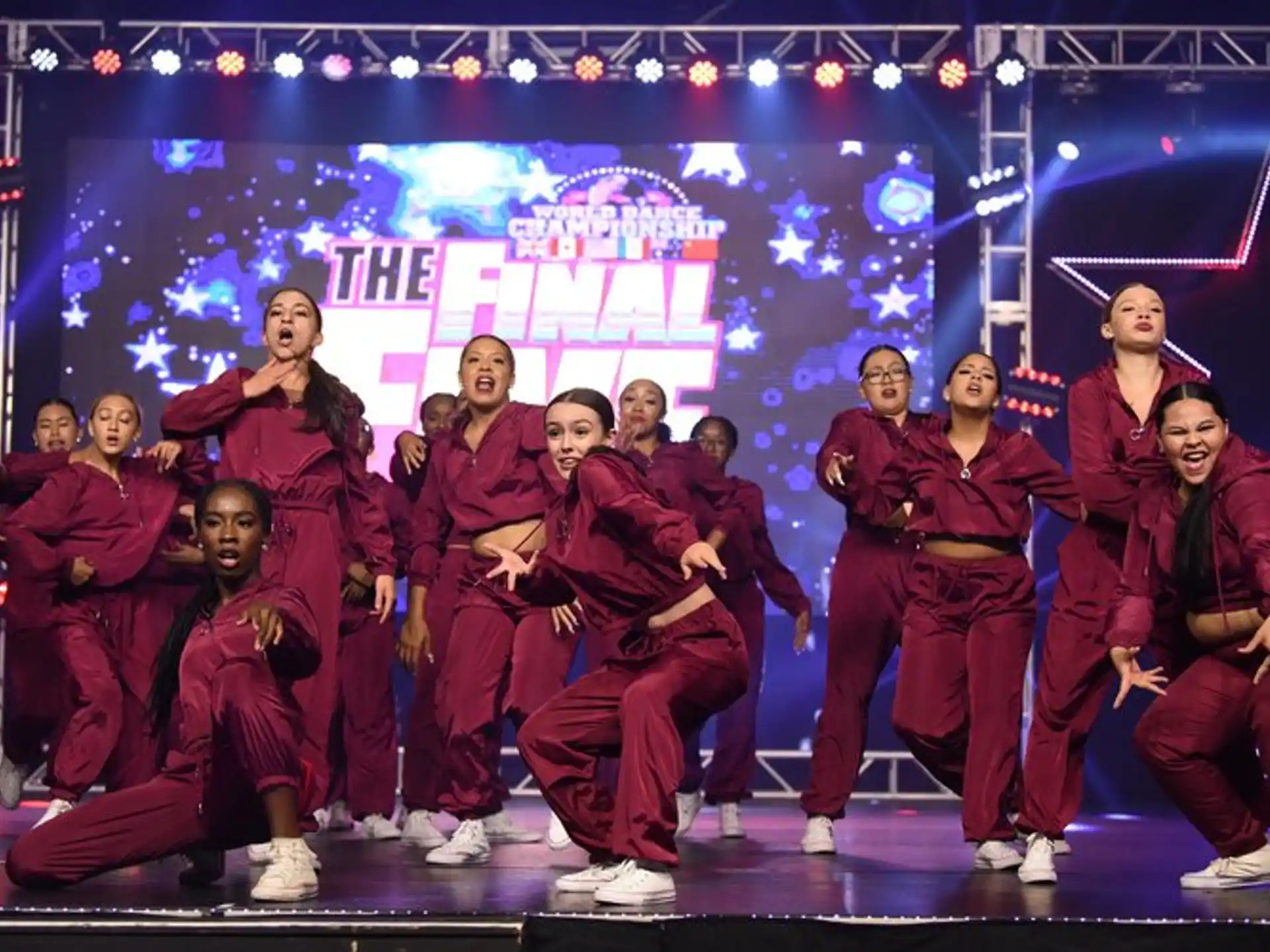 a group of people in red uniforms