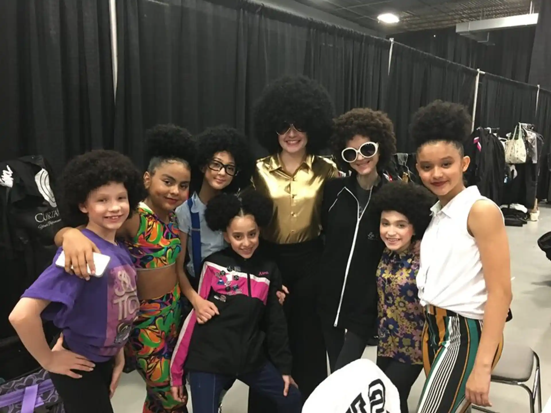 a group of people posing for a photo