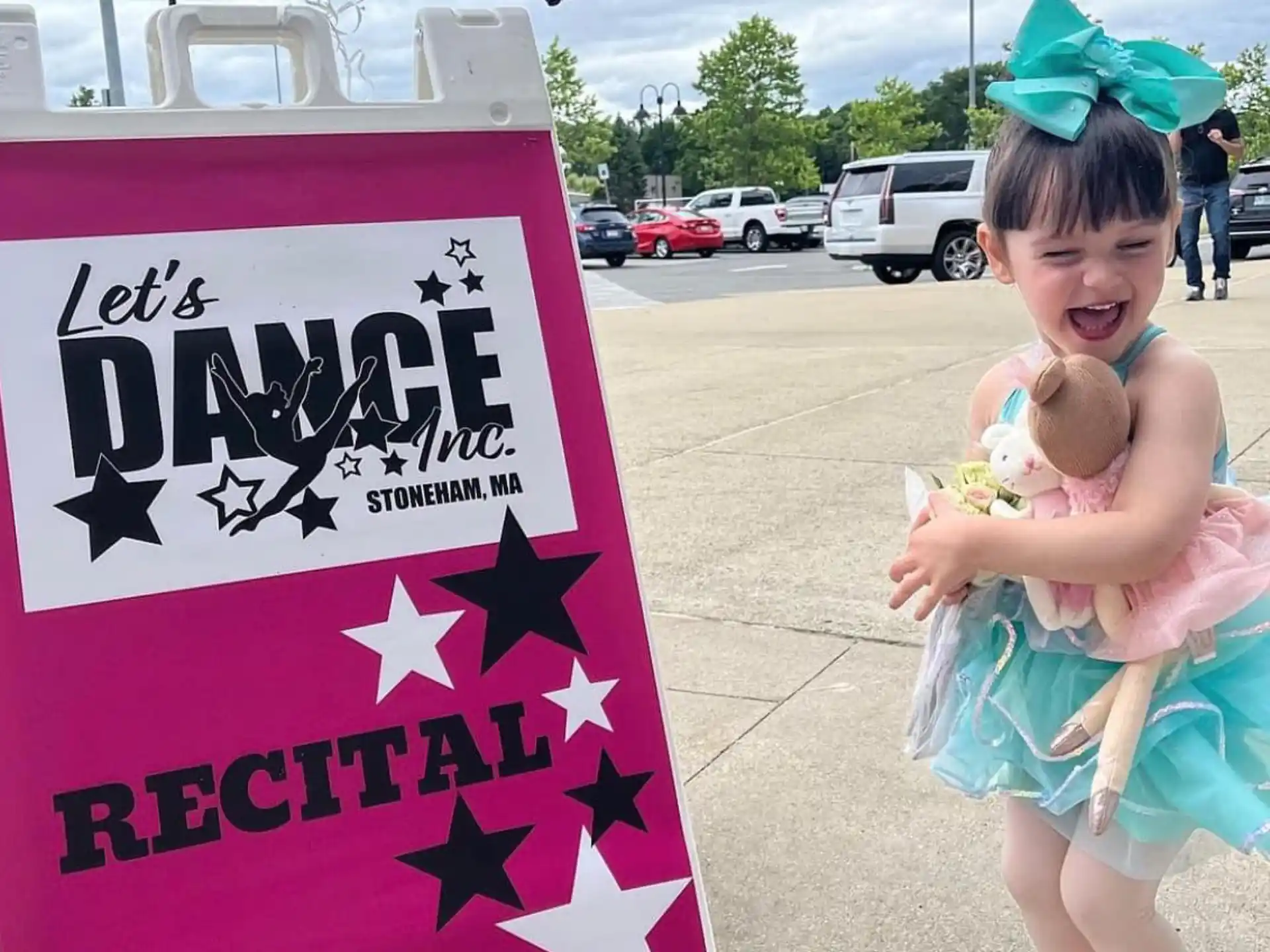 a child holding a baby