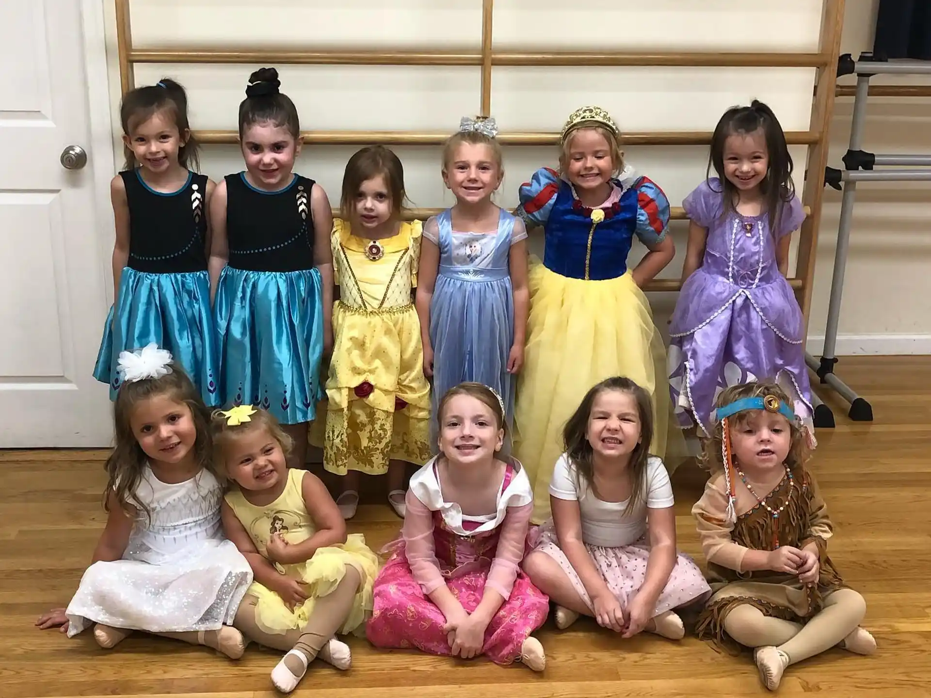 a group of girls posing for a photo