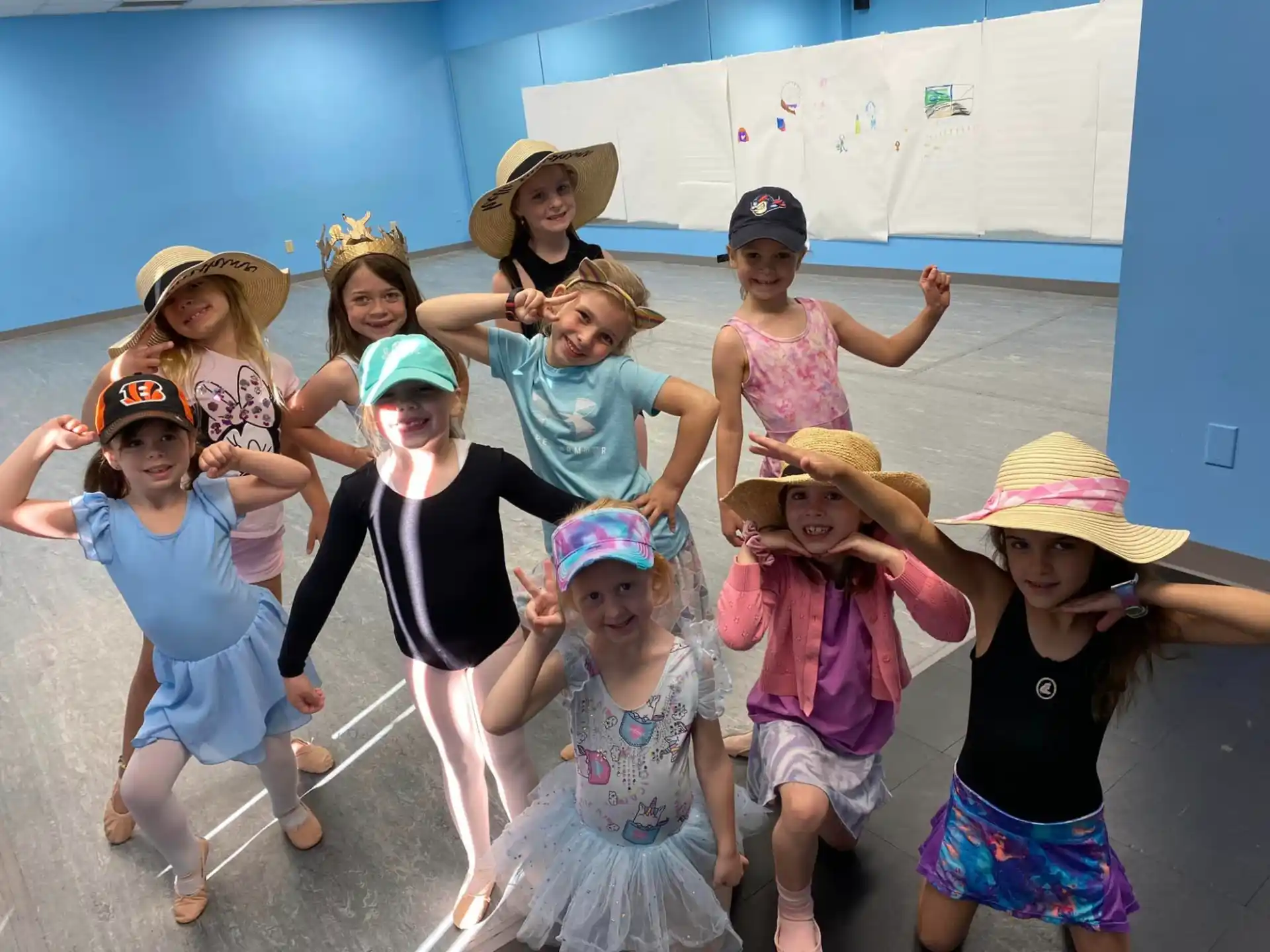 a group of children wearing hats