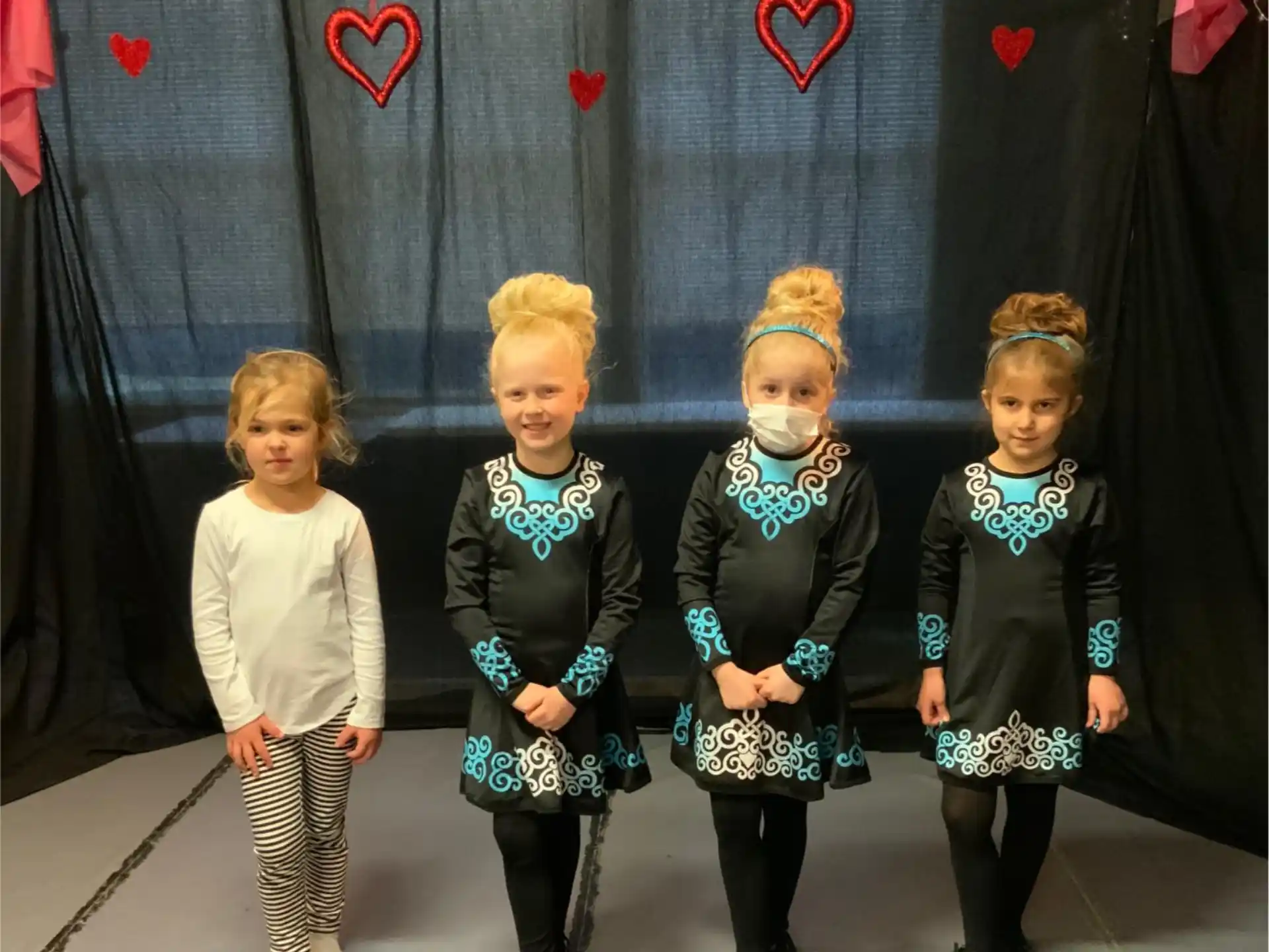 a group of children in clothing