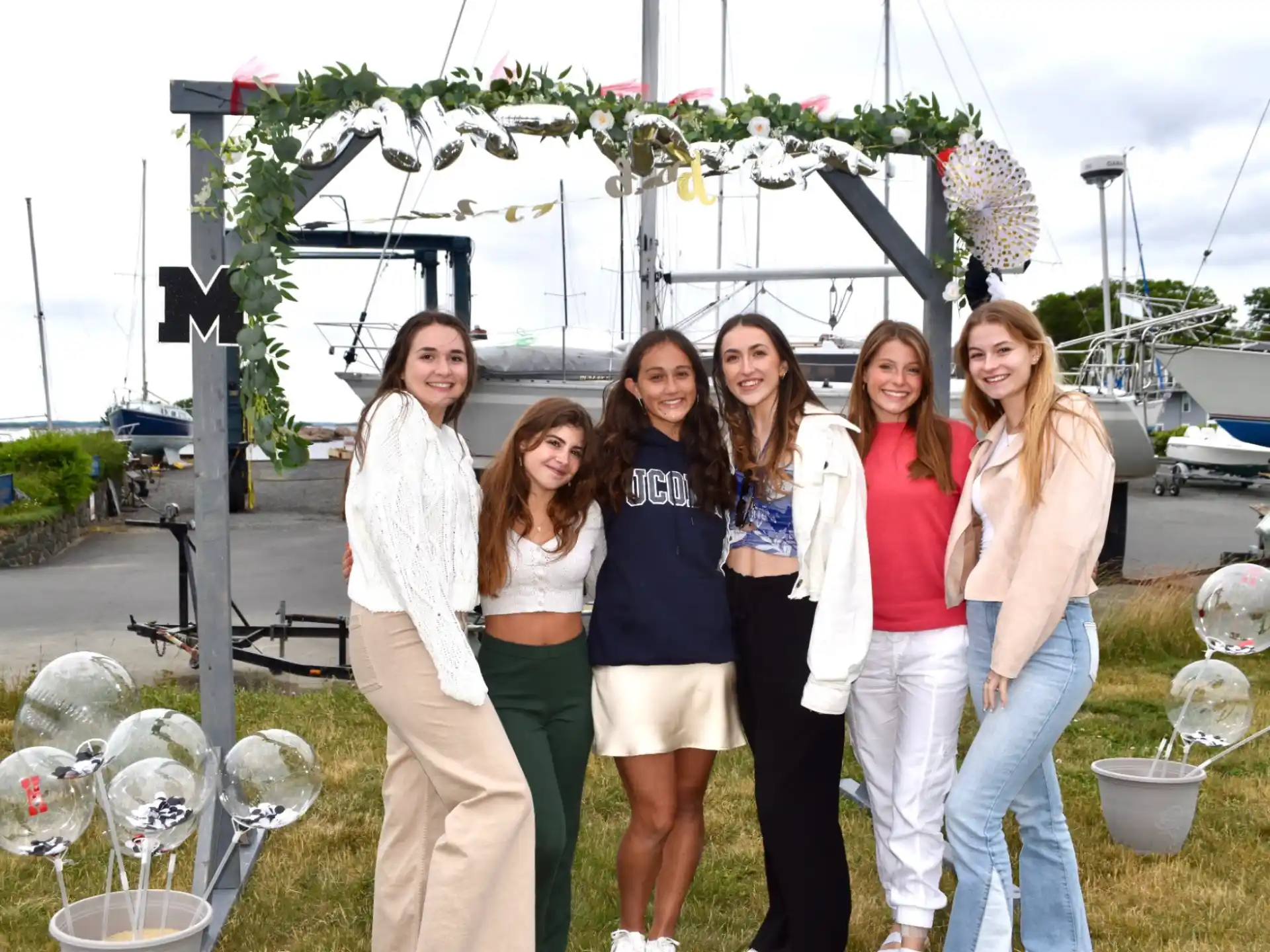 a group of women posing for a photo