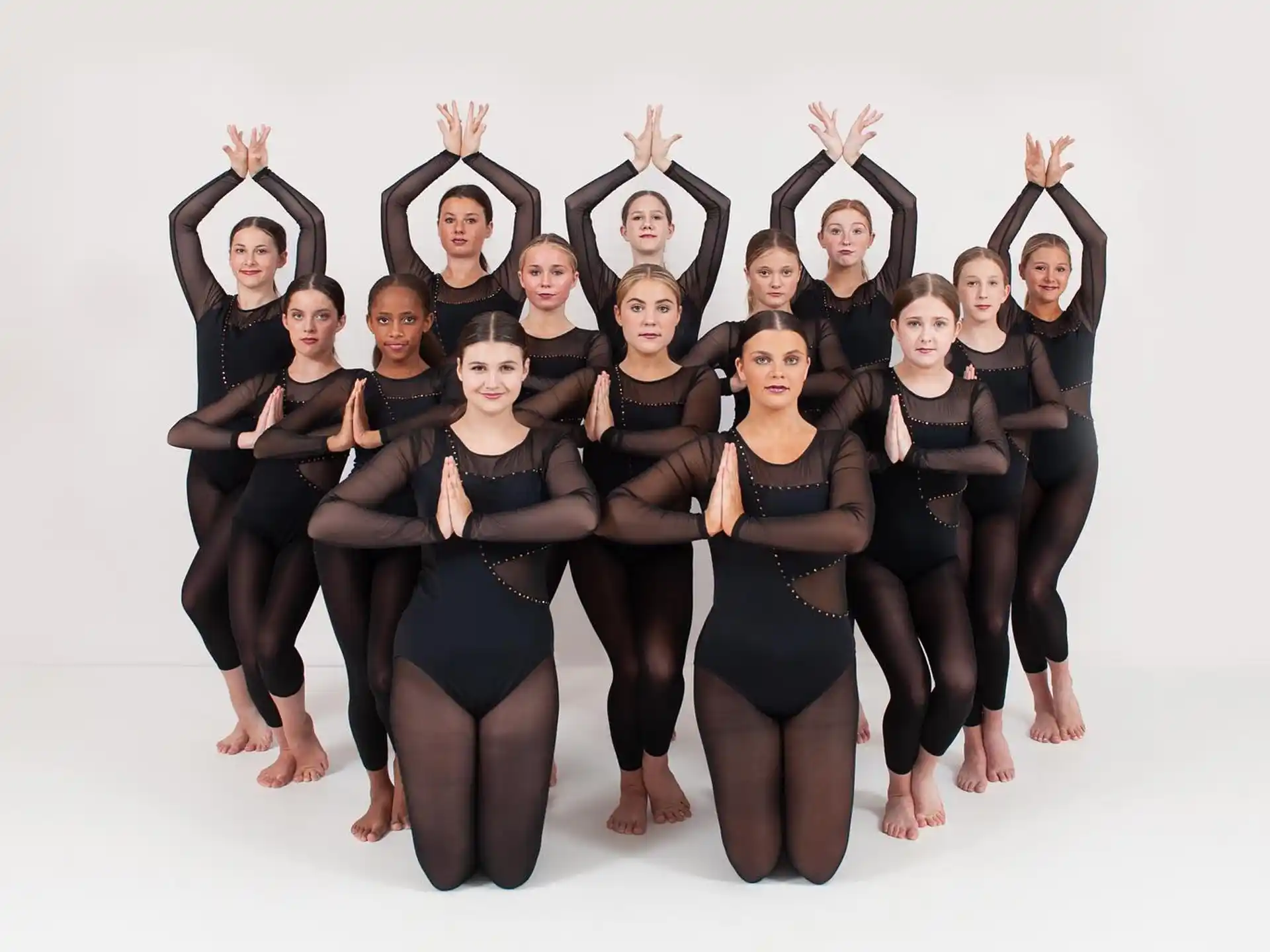a group of women in black and white