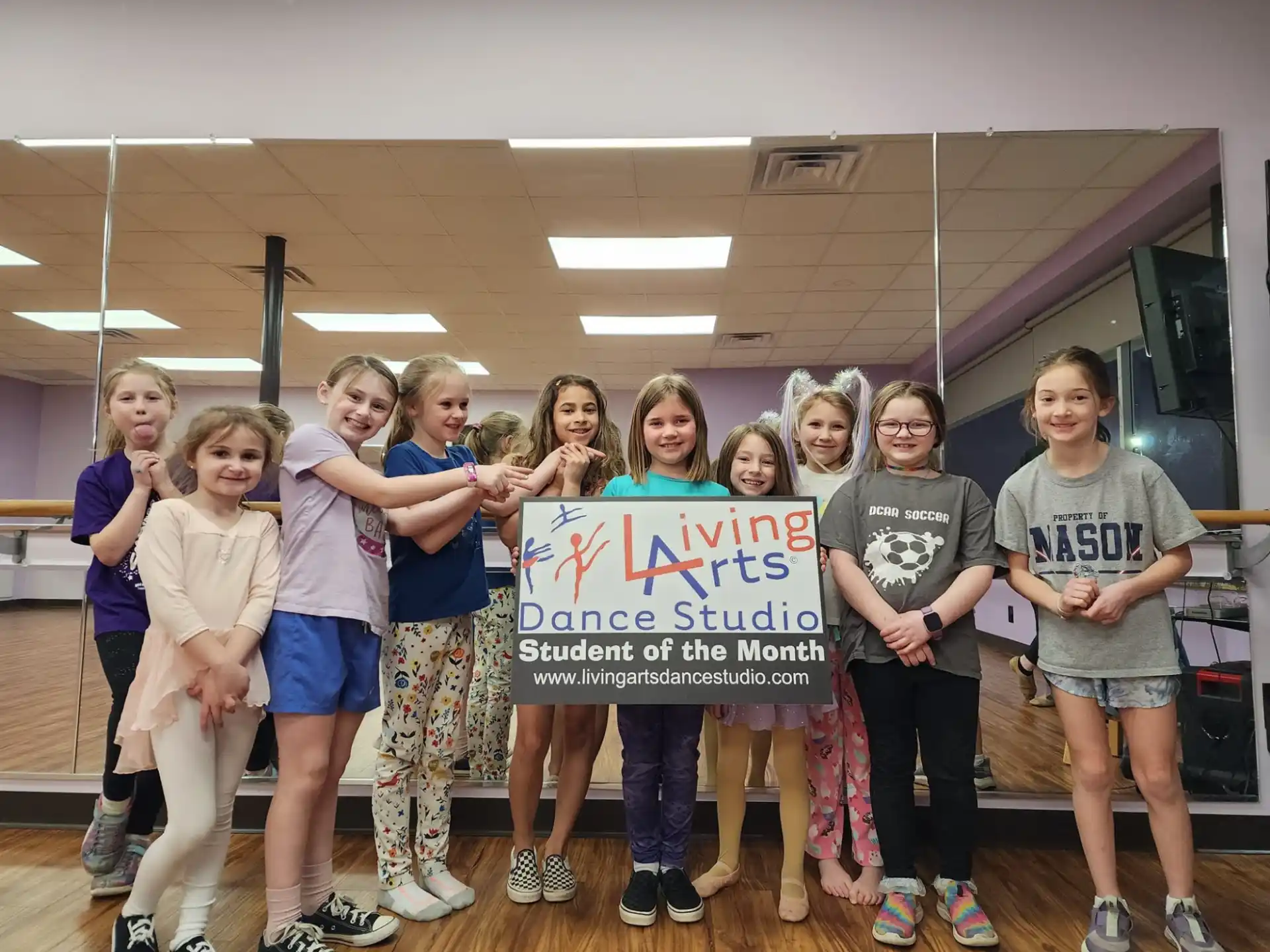 a group of people holding a sign