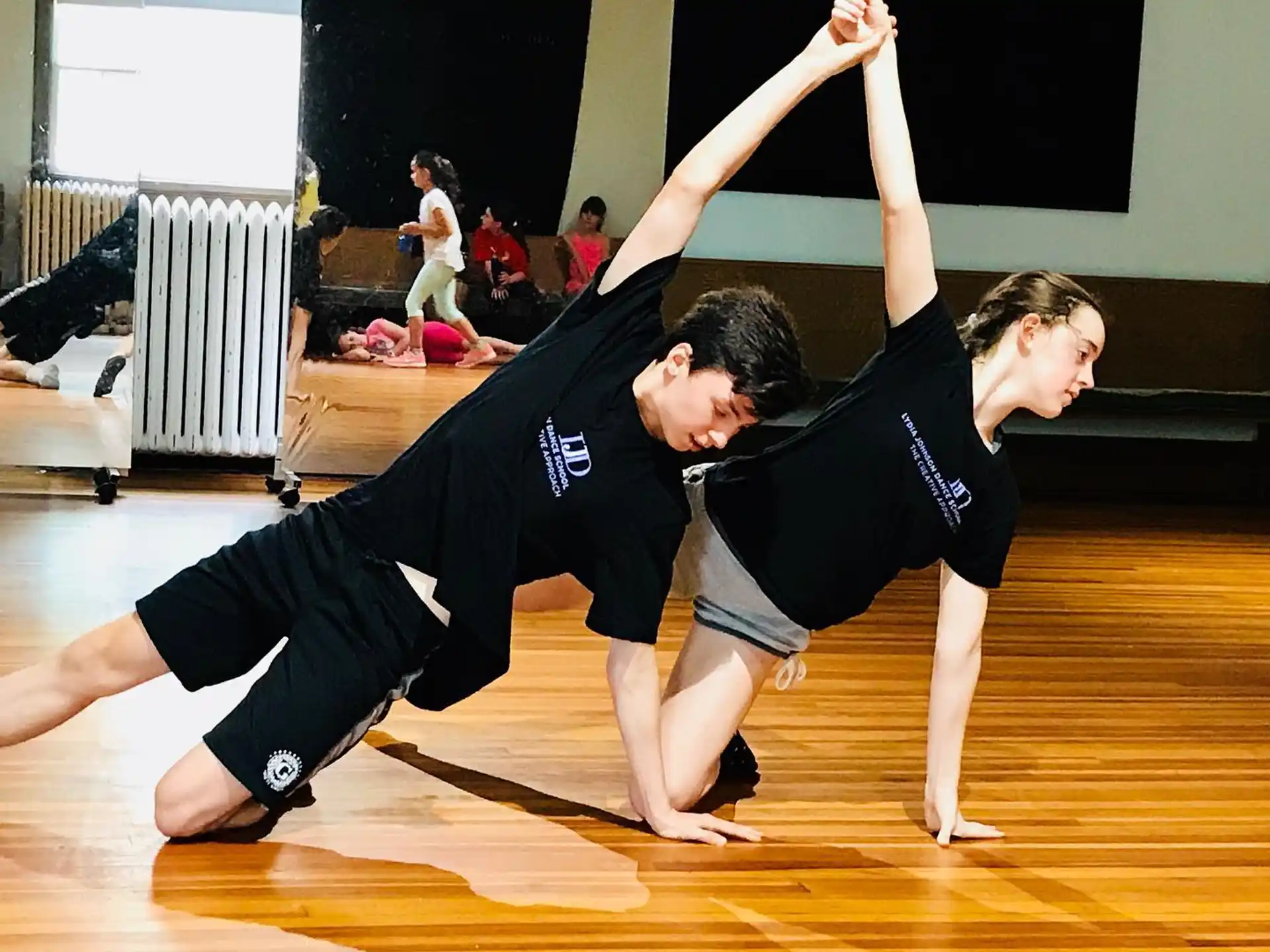 a couple of people dancing