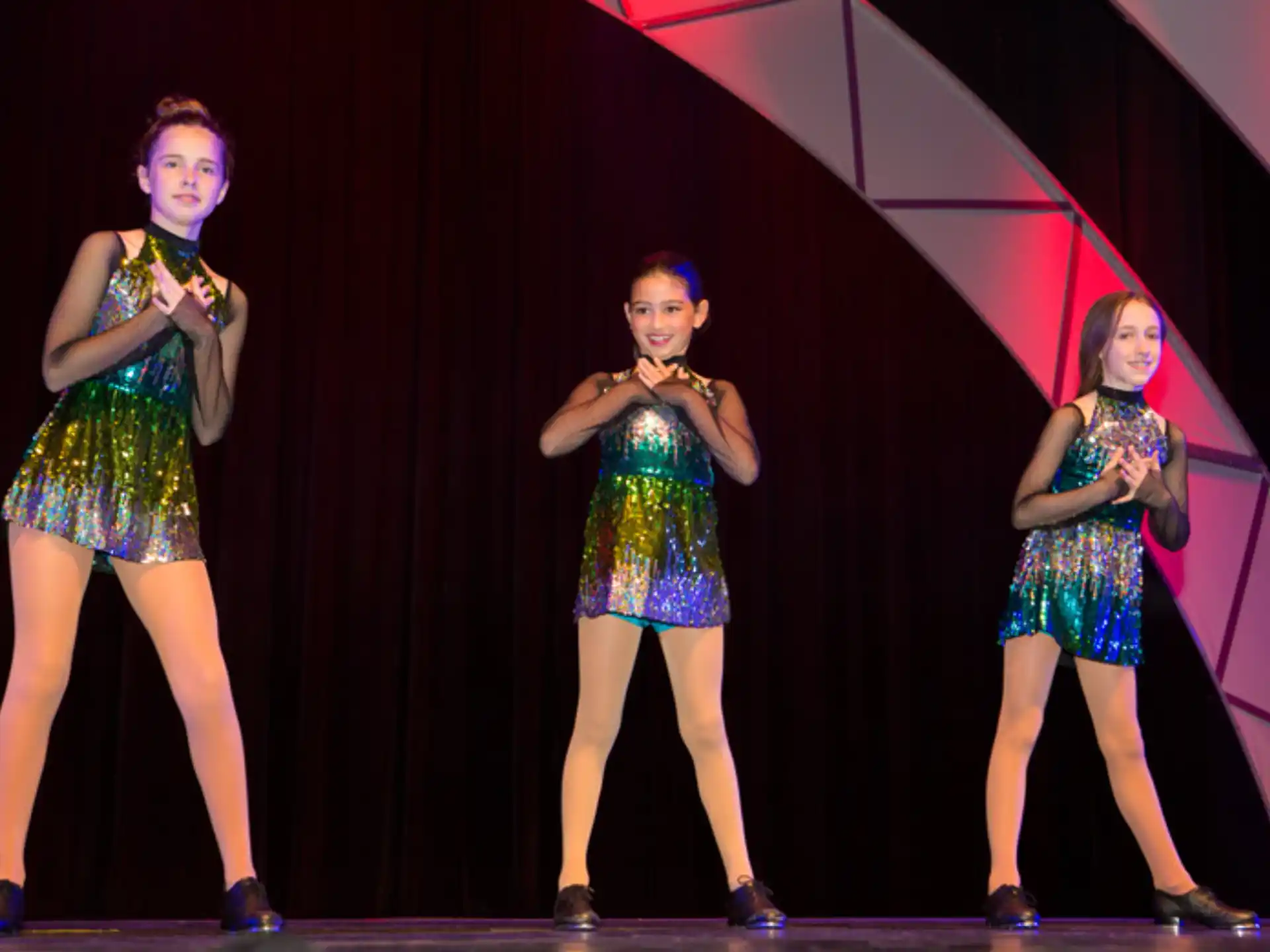 a group of women on a stage