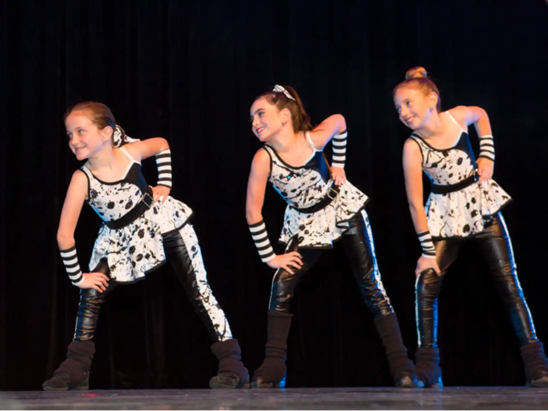 a group of women on a stage