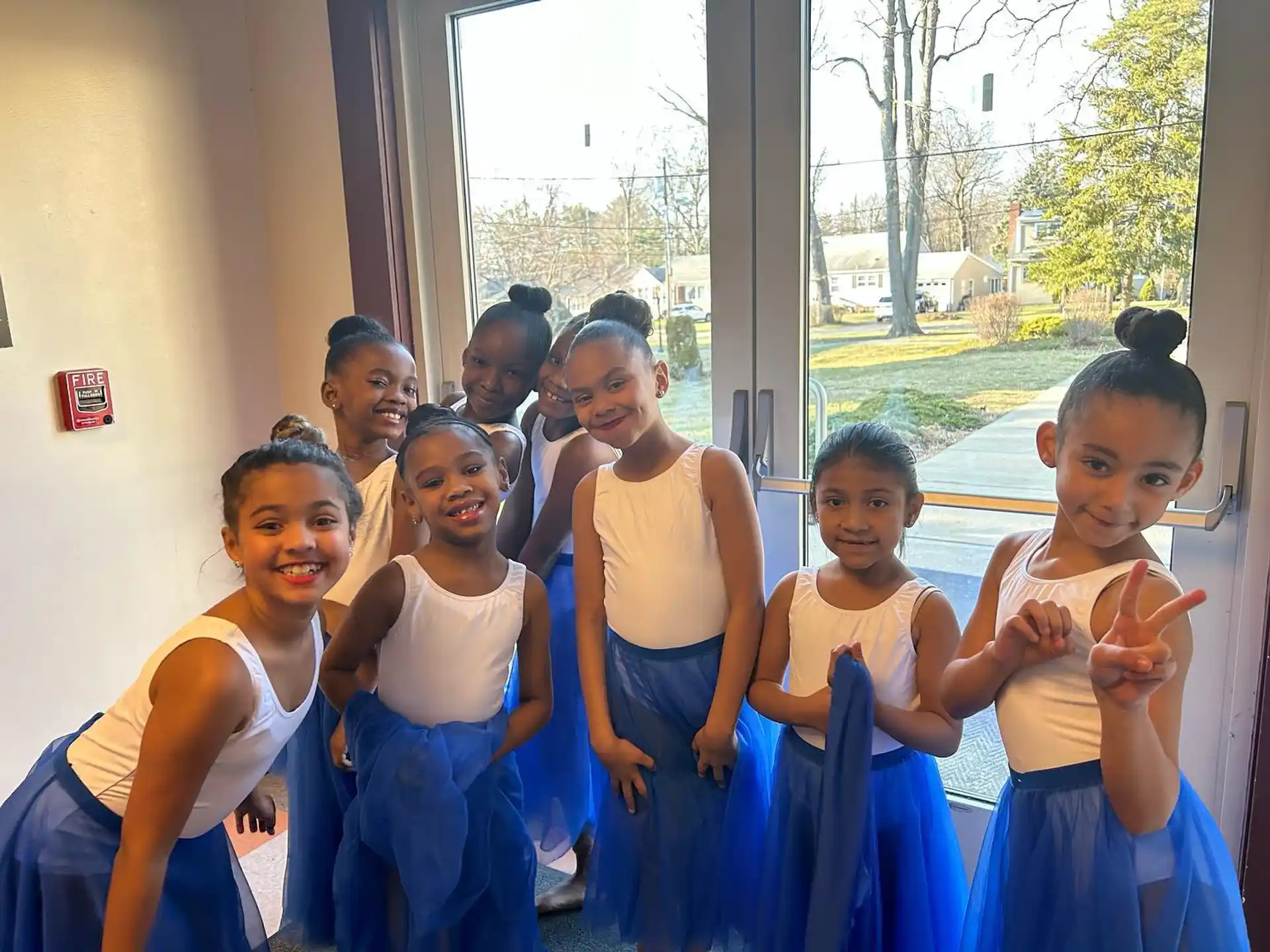 a group of children posing for a photo