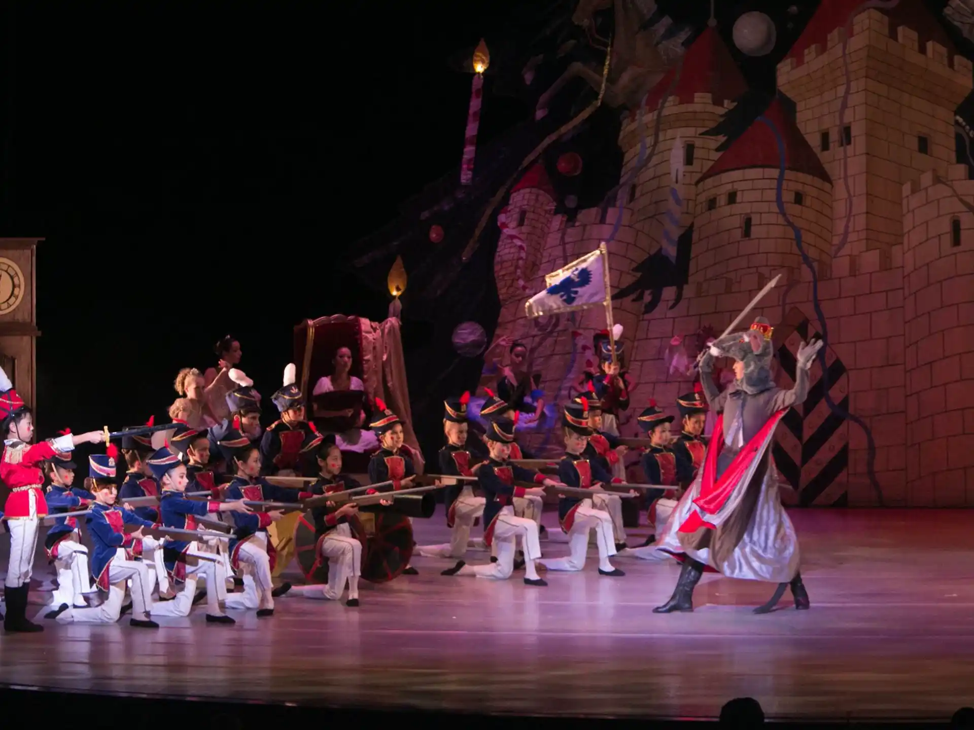 a group of people performing on a stage