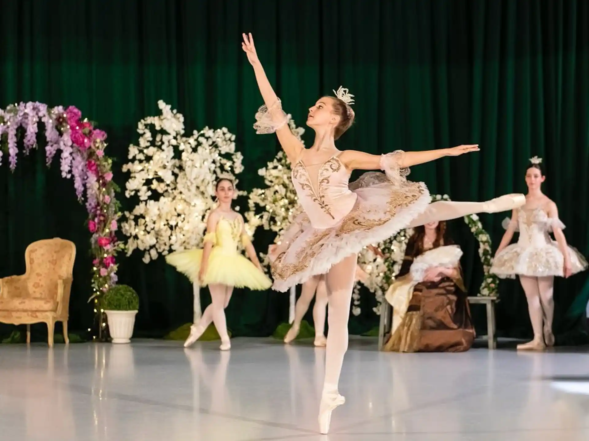 a group of women dancing on a stage