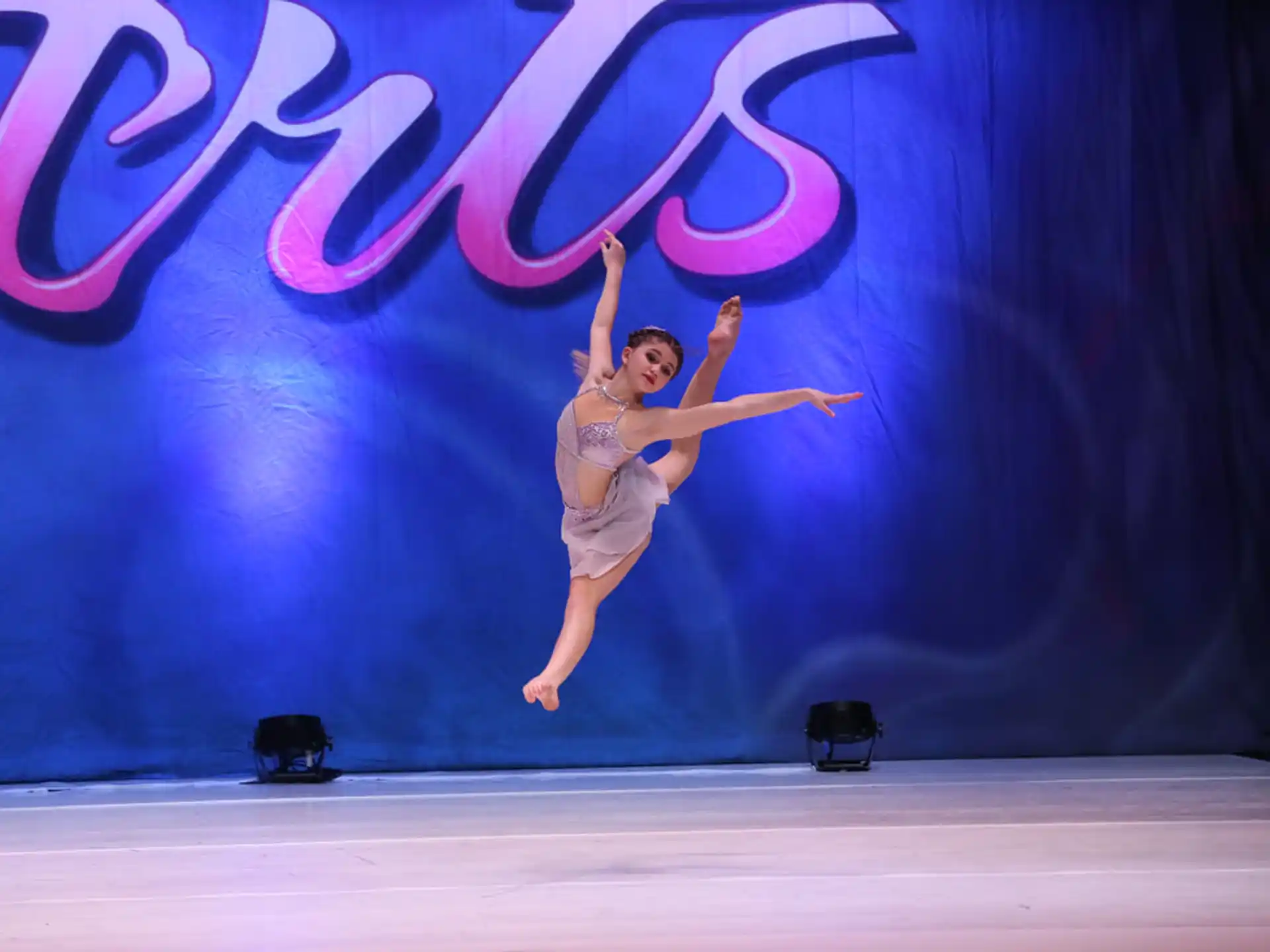 a person dancing on a stage