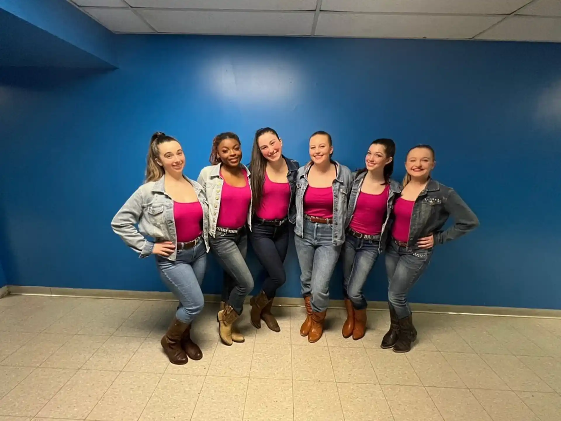 a group of people posing for a photo