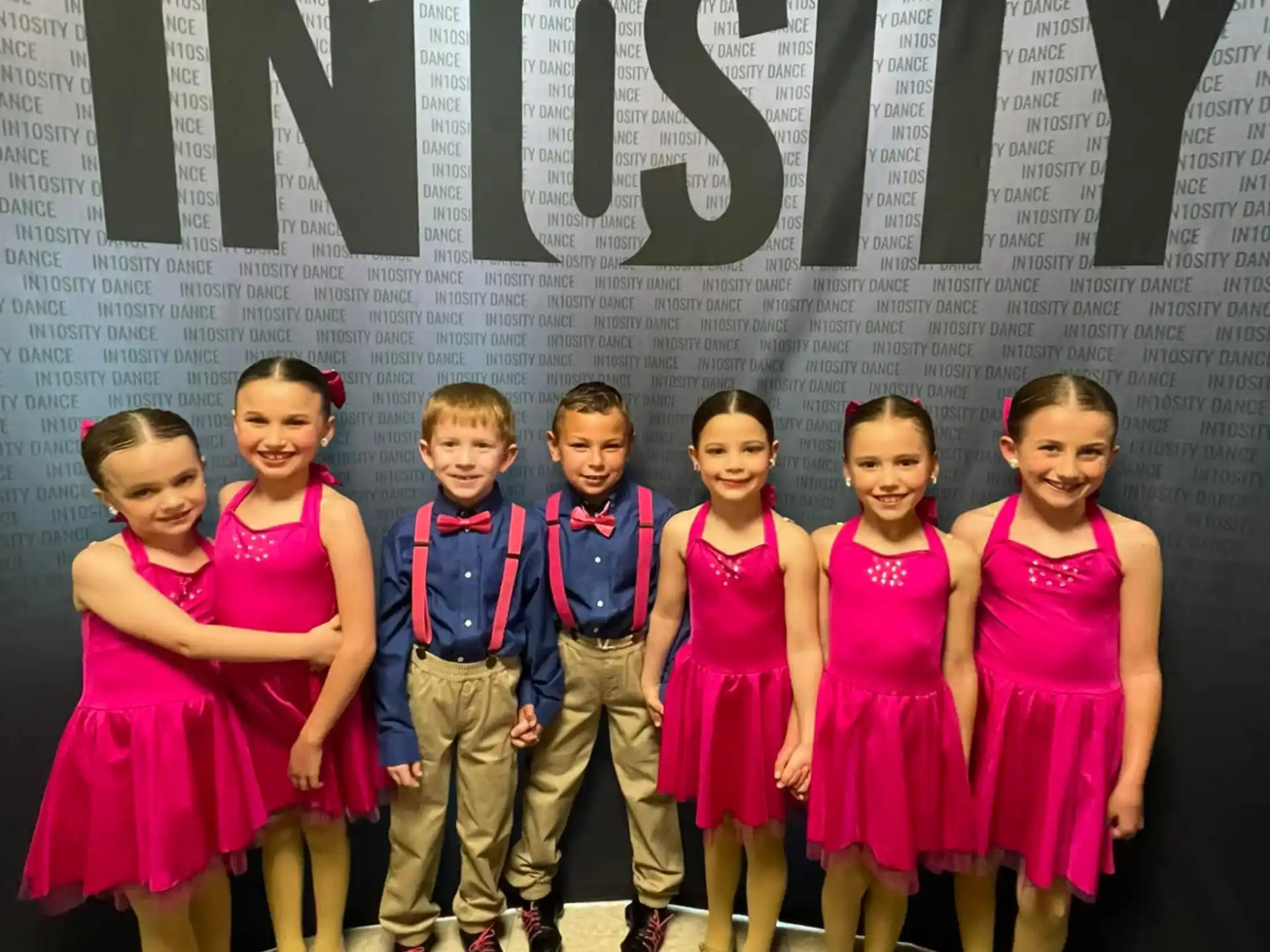 a group of children posing for a photo