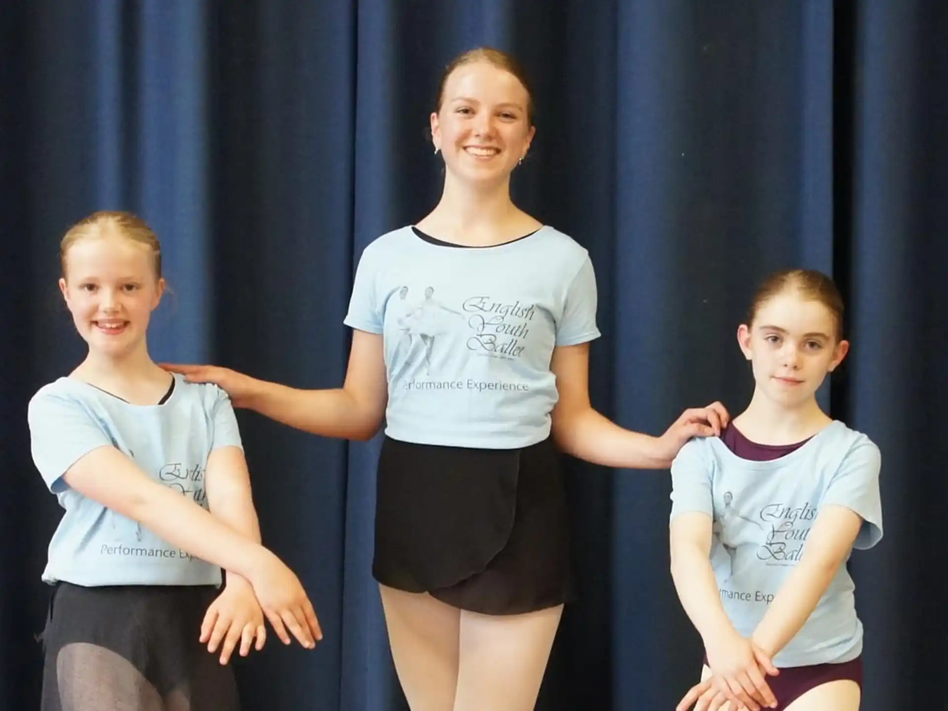 a group of girls posing for a photo