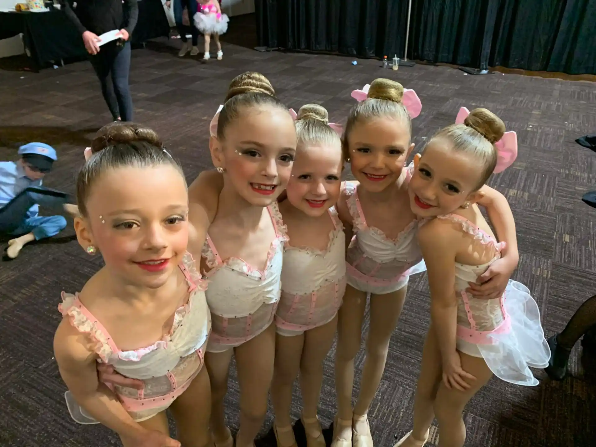 a group of girls wearing clothing