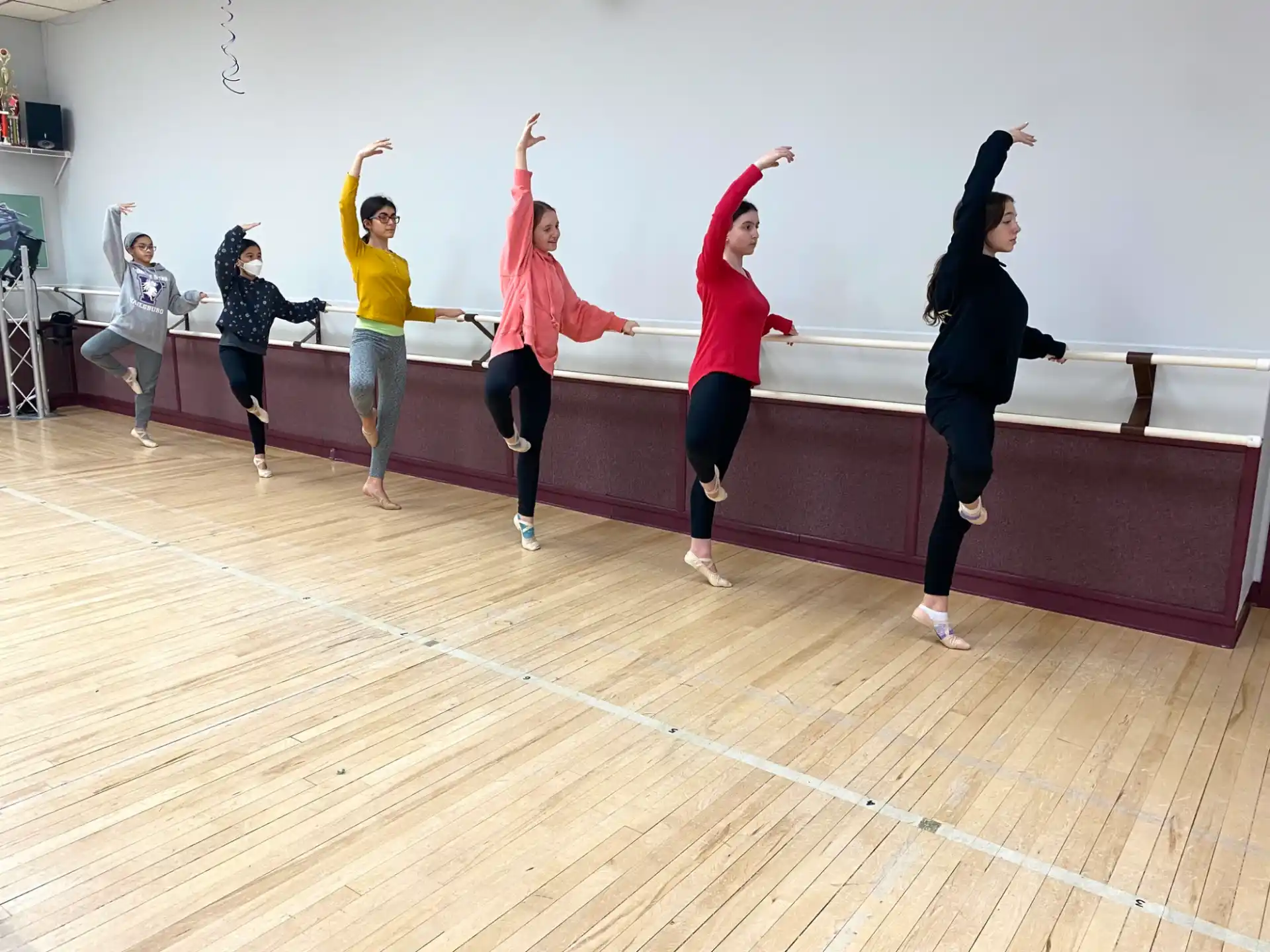 a group of women jumping in the air