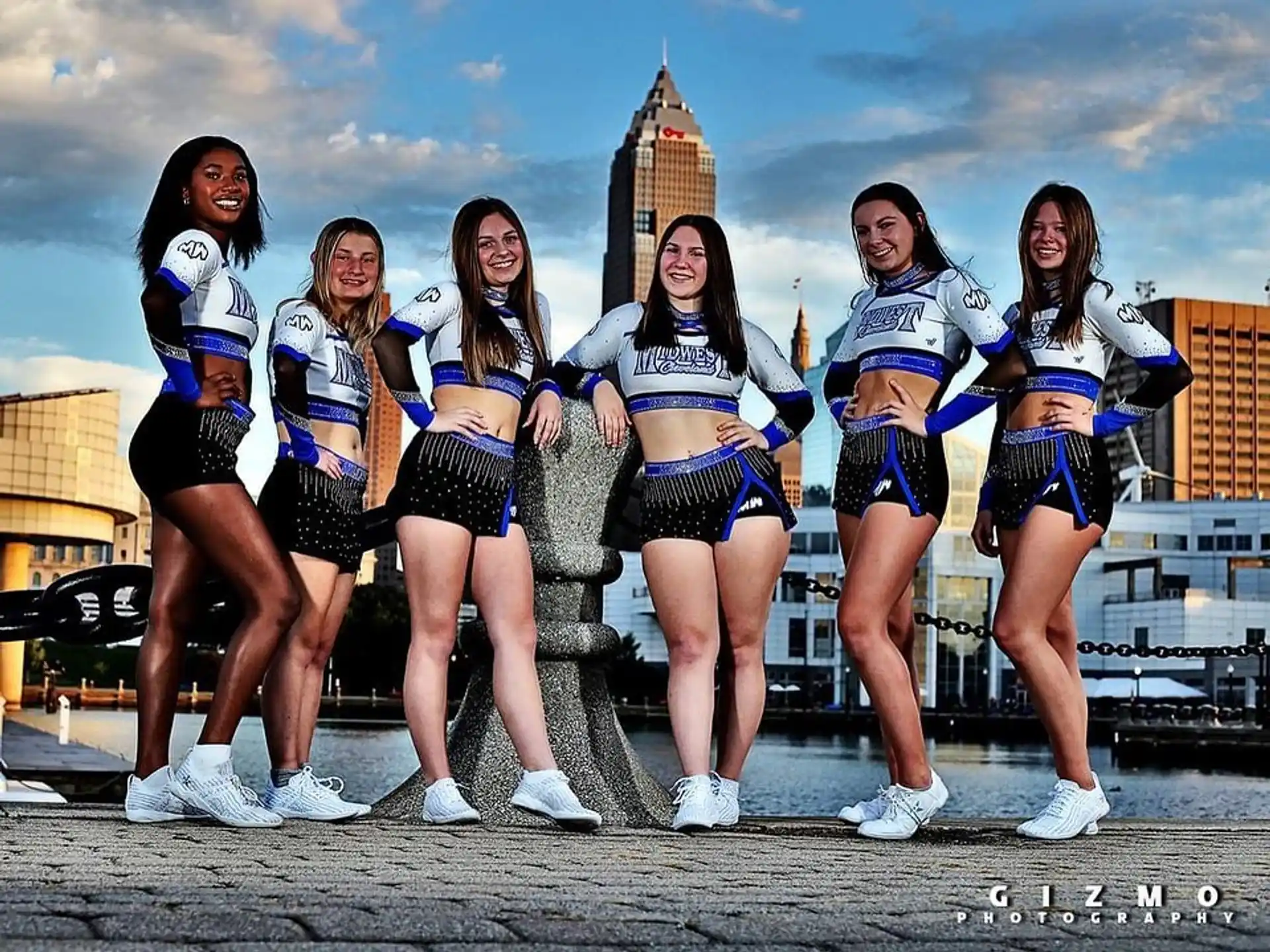 a group of women posing for a photo