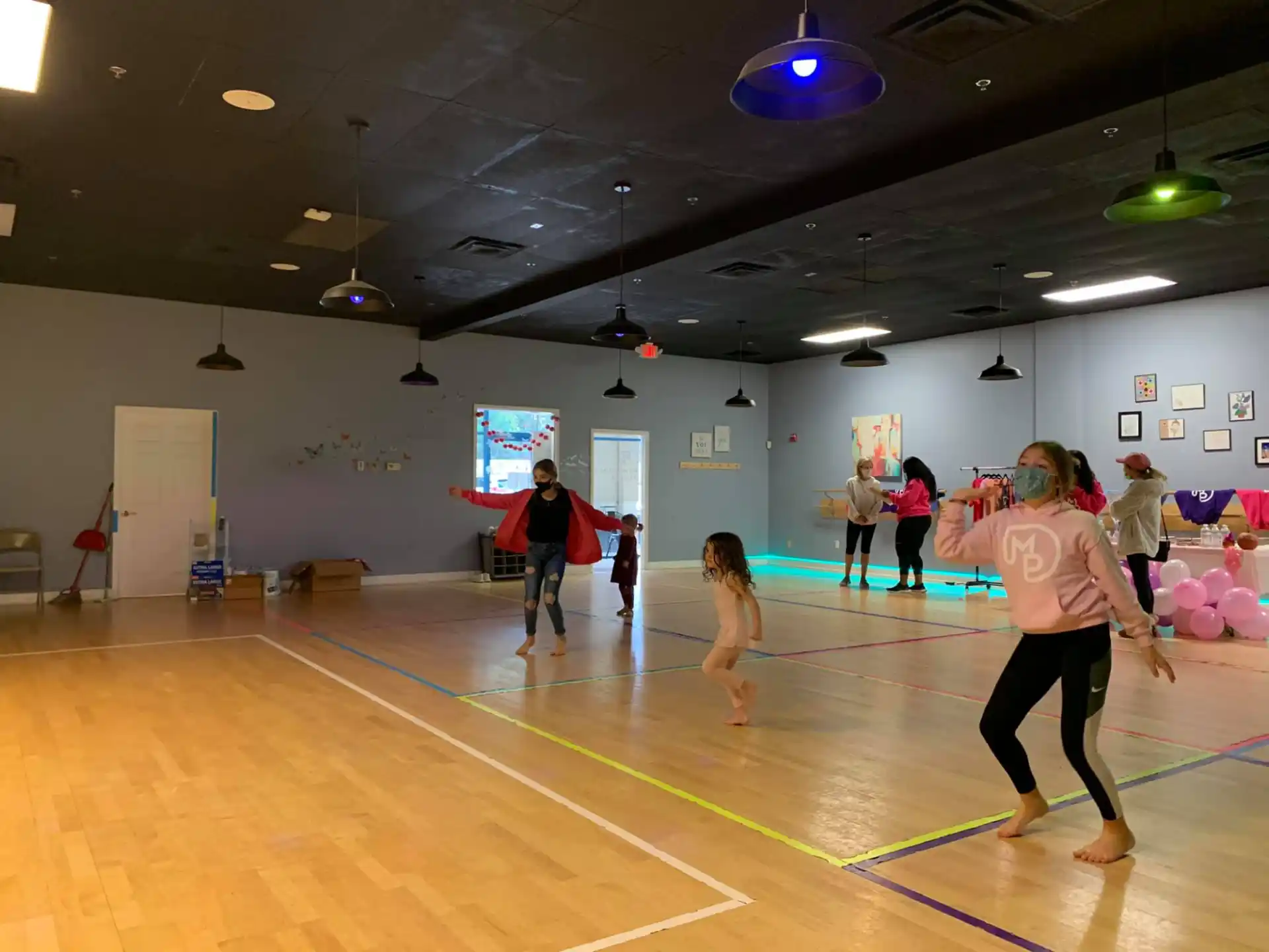 a group of people playing basketball
