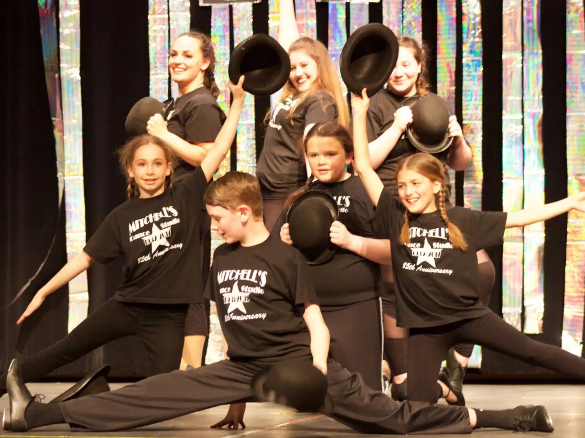 a group of people wearing black shirts